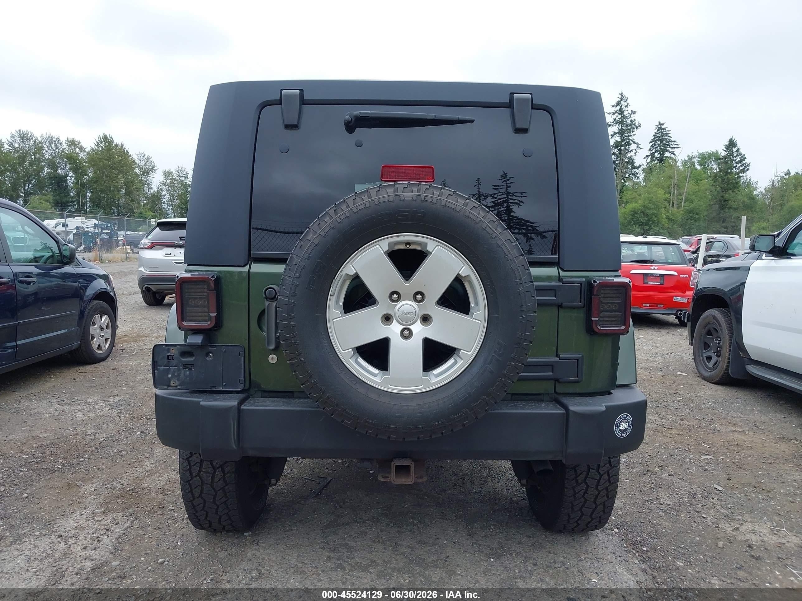 2007 Jeep Wrangler Unlimited Sahara Green vin: 1J8GA59197L189401