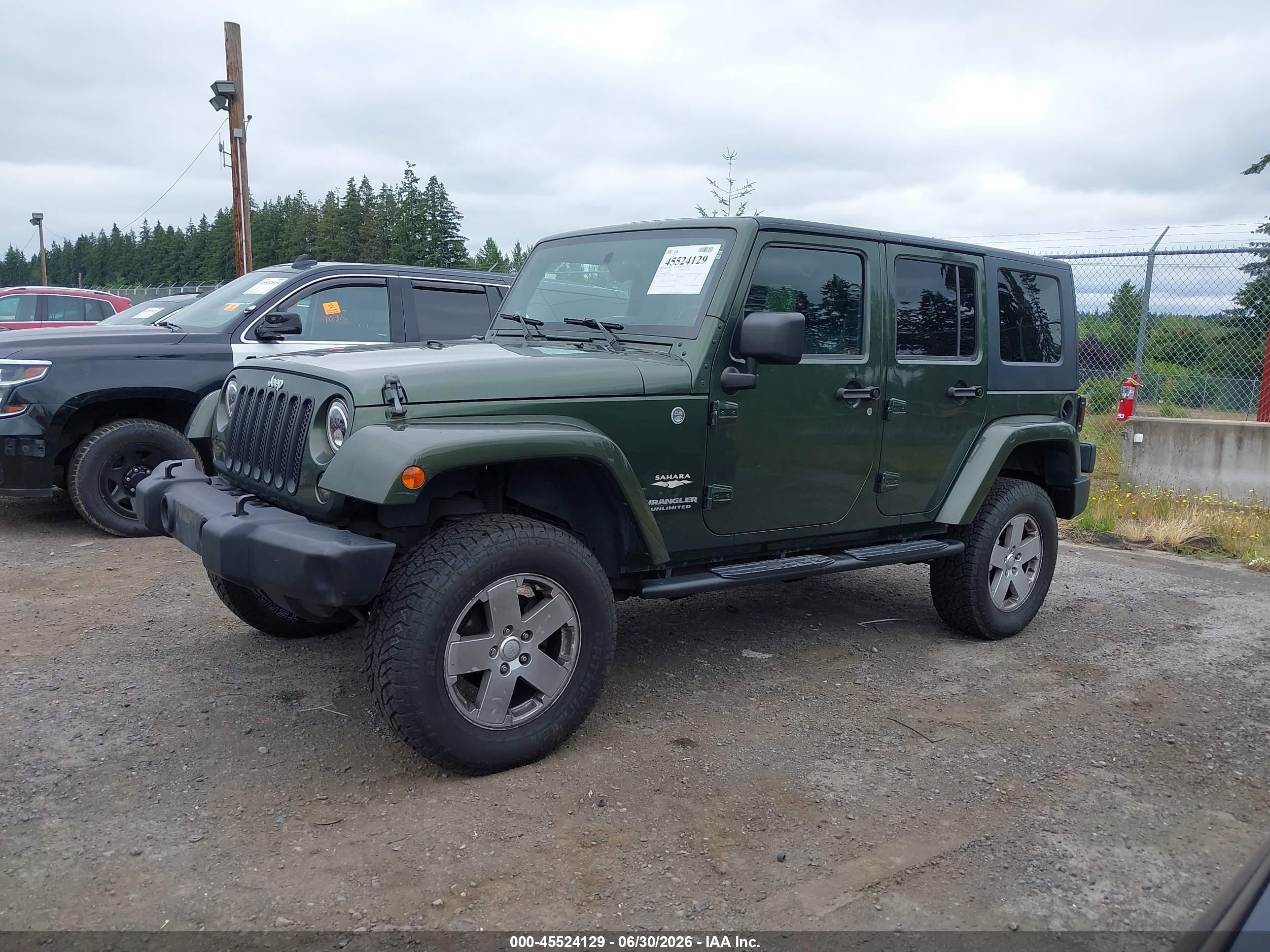 2007 Jeep Wrangler Unlimited Sahara Green vin: 1J8GA59197L189401