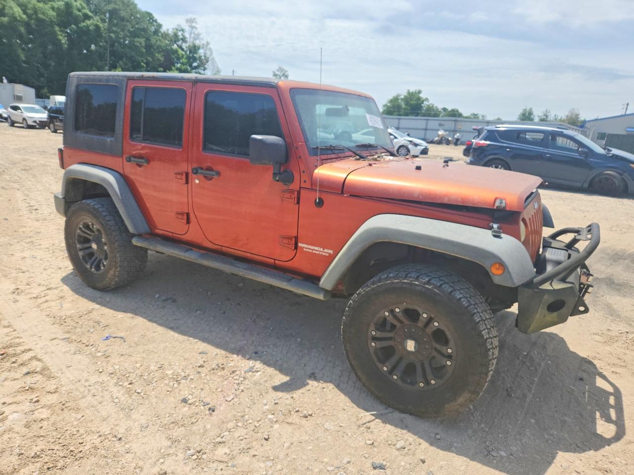 2009 Jeep Wrangler Unlimited Rubicon Orange vin: 1J8GA69169L707666