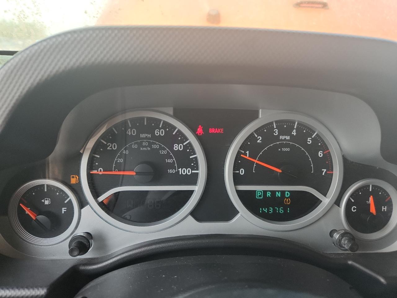 2009 Jeep Wrangler Unlimited Rubicon Orange vin: 1J8GA69169L707666 Damage: Warning - Tire Pressure, On, Unacceptable