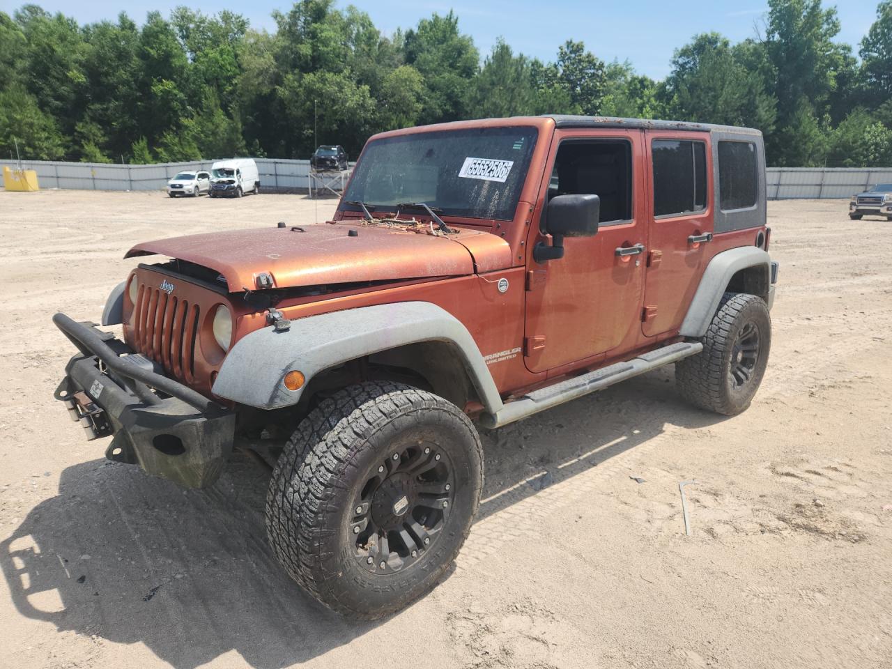 2009 Jeep Wrangler Unlimited Rubicon Orange vin: 1J8GA69169L707666 Damage: Left Front Window, Missing, Replacement Required