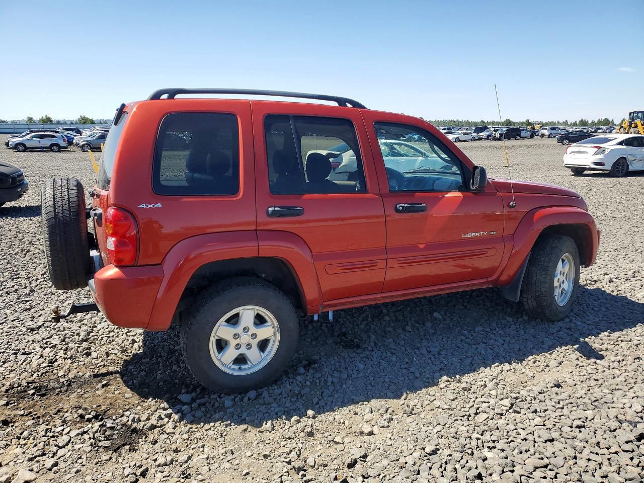 2002 Jeep Liberty Limited Orange vin: 1J8GL58K32W187414