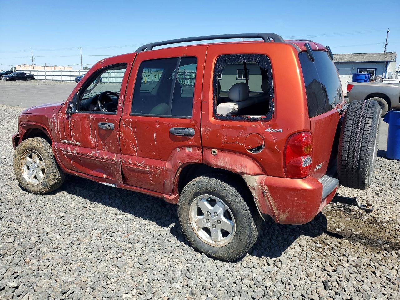 2002 Jeep Liberty Limited Orange vin: 1J8GL58K32W187414