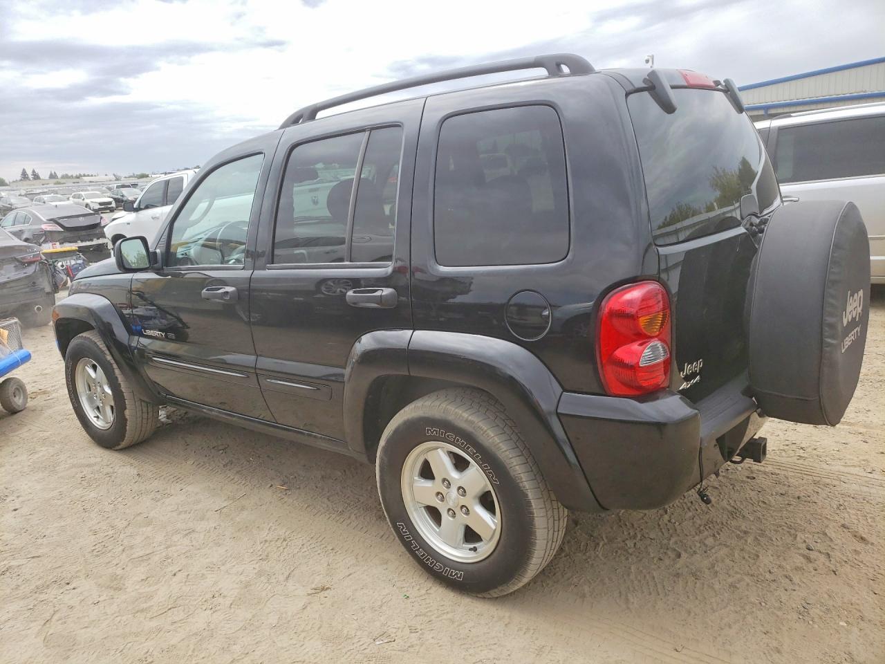 2003 Jeep Liberty Limited Black vin: 1J8GL58KX3W503778