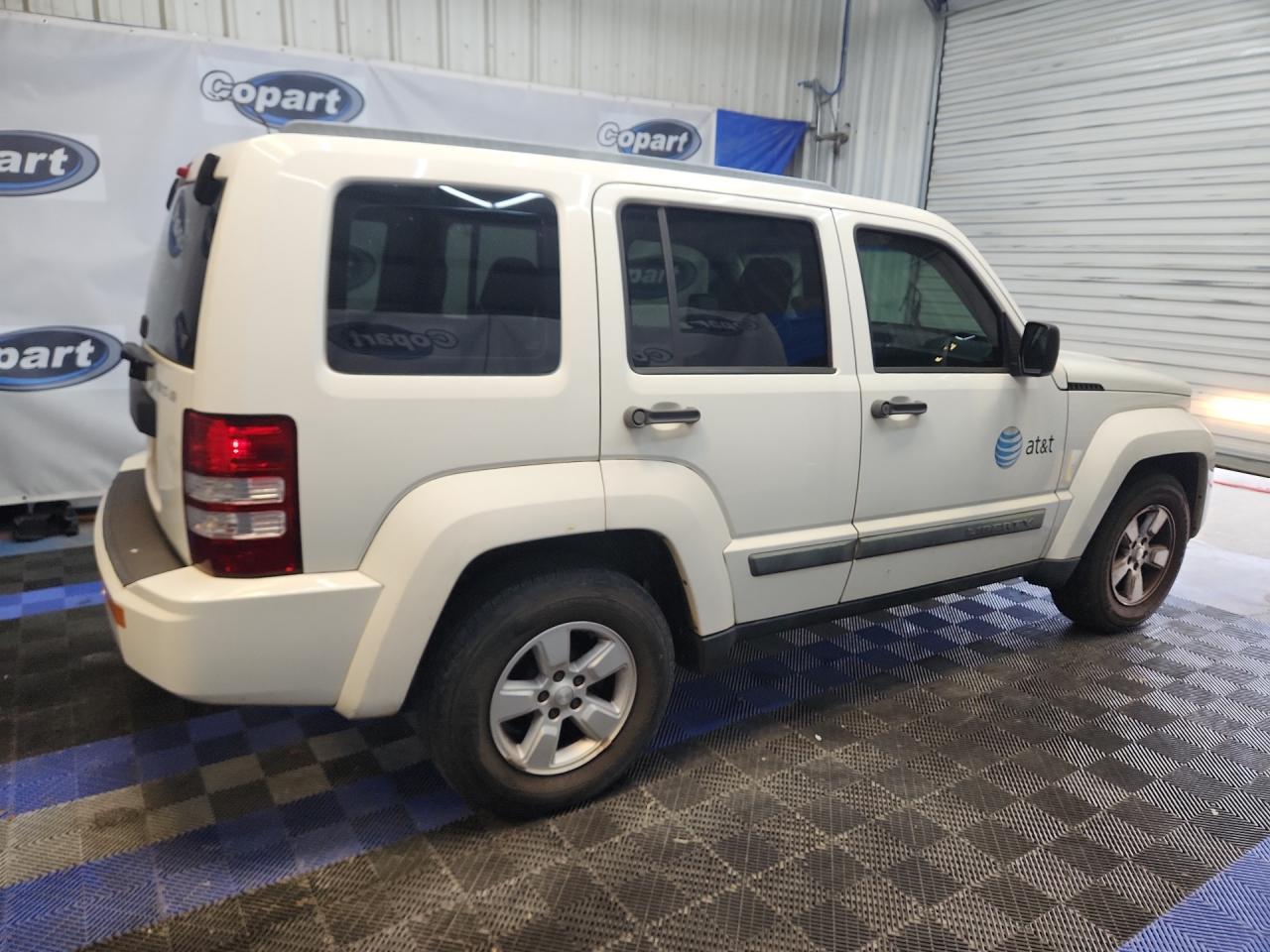 2009 Jeep Liberty Sport White vin: 1J8GN28K89W558621 Damage: Right Qtr Panel Cladding, Heavy Scratch, 1/2 To 1 Inch