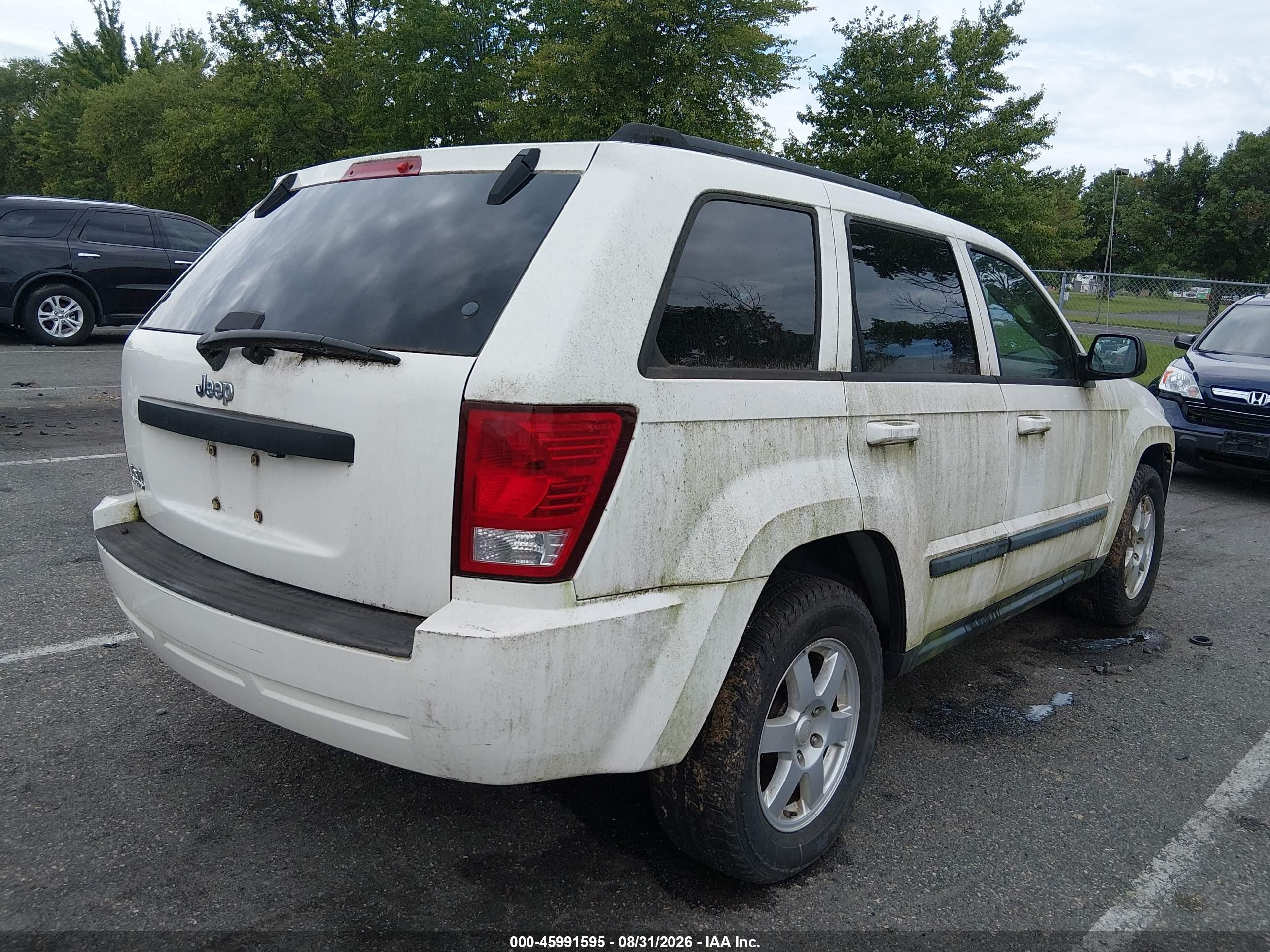 2008 Jeep Grand Cherokee Laredo Белый vin: 1J8GR48K08C235079