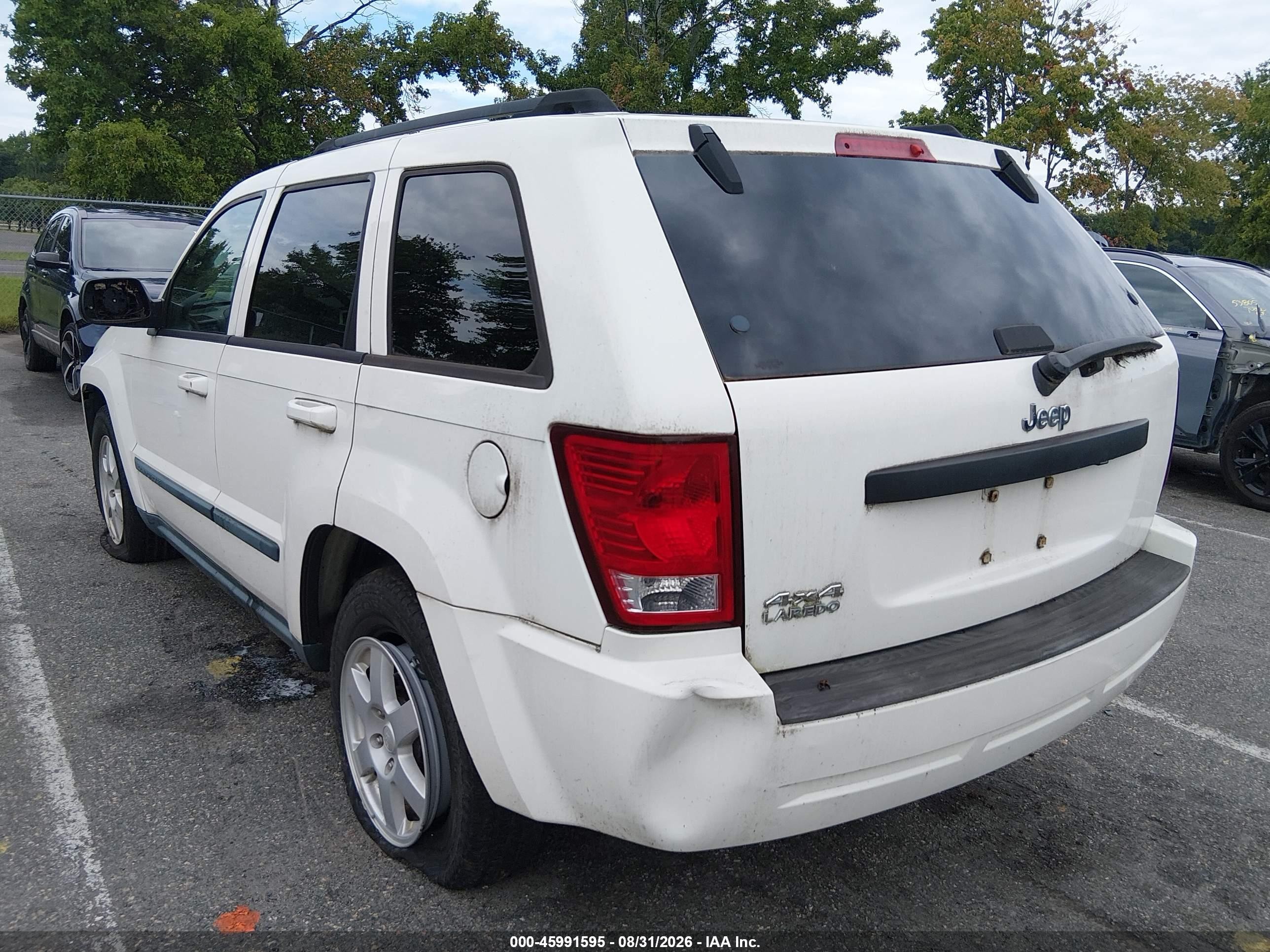 2008 Jeep Grand Cherokee Laredo Белый vin: 1J8GR48K08C235079