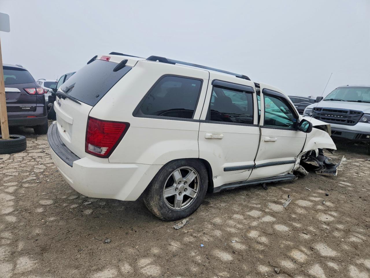 2007 Jeep Grand Cherokee Laredo Белый vin: 1J8GR48K17C521585