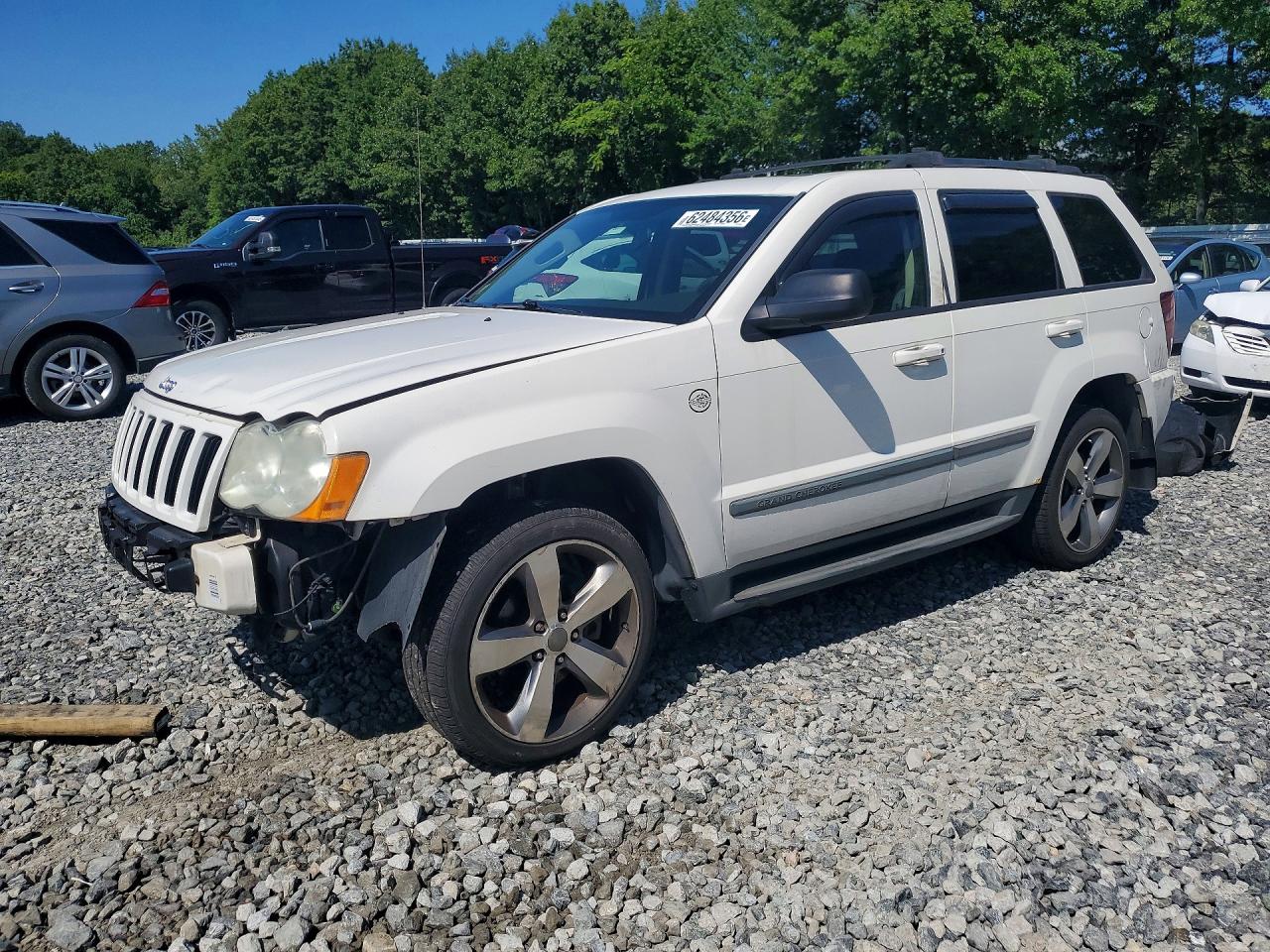 2009 Jeep Grand Cherokee Laredo Белый vin: 1J8GR48K19C526708