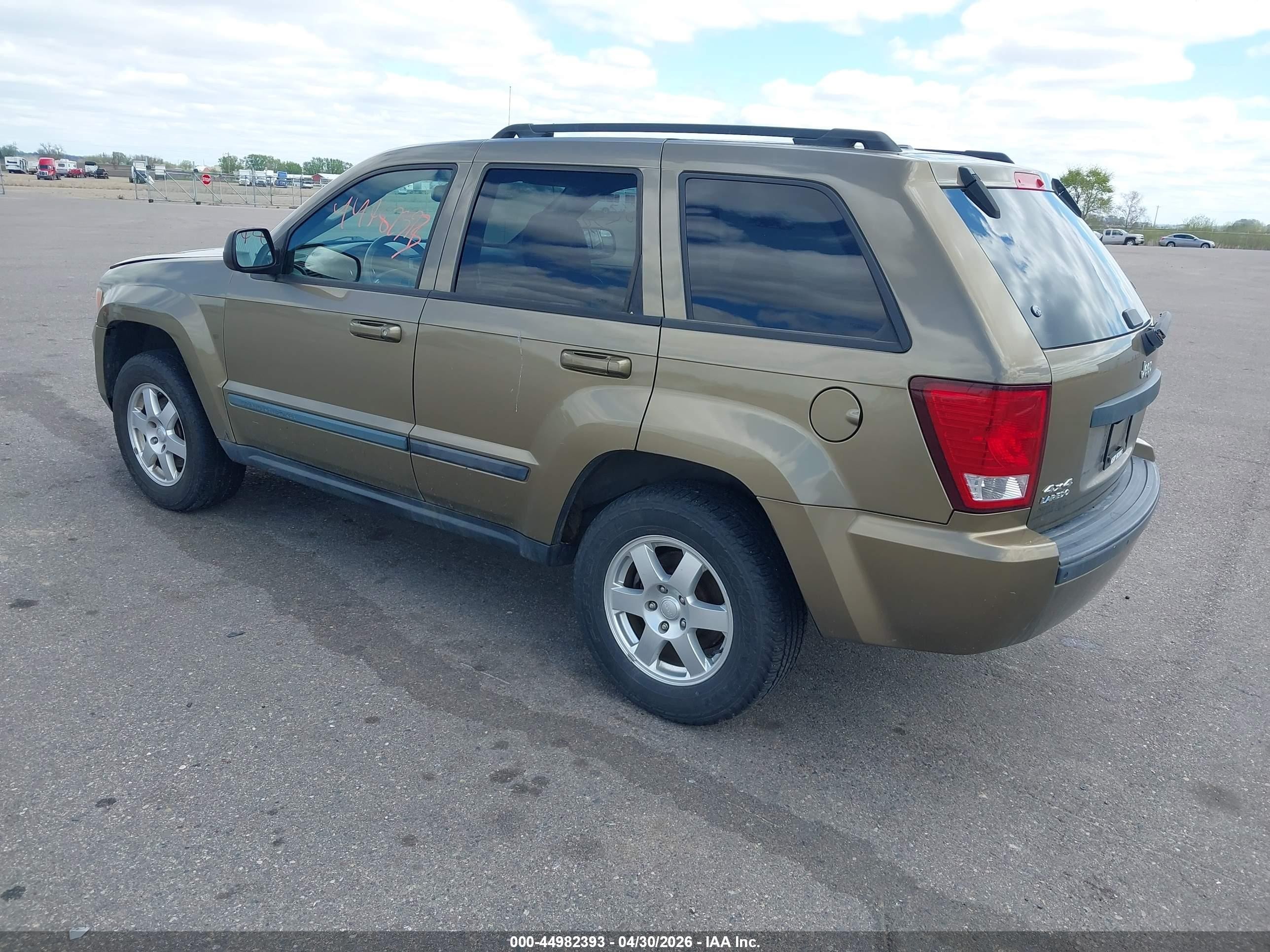 2009 Jeep Grand Cherokee Laredo Gold vin: 1J8GR48K19C538664