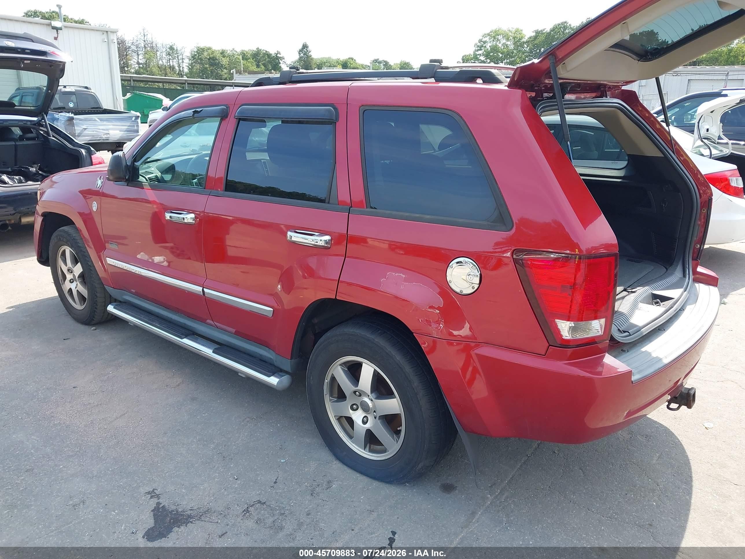 2009 Jeep Grand Cherokee Laredo Red vin: 1J8GR48K49C554308