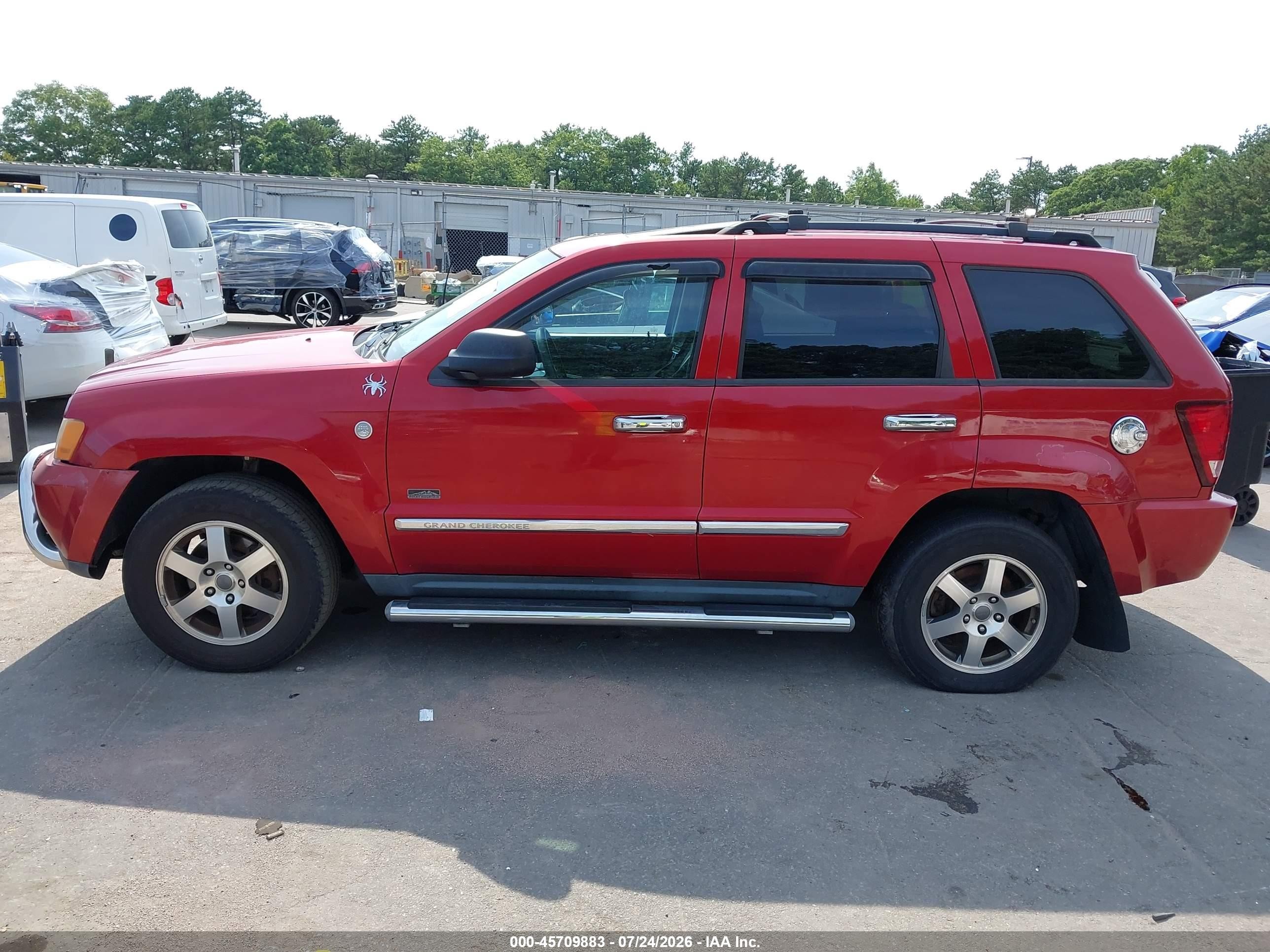 2009 Jeep Grand Cherokee Laredo Red vin: 1J8GR48K49C554308