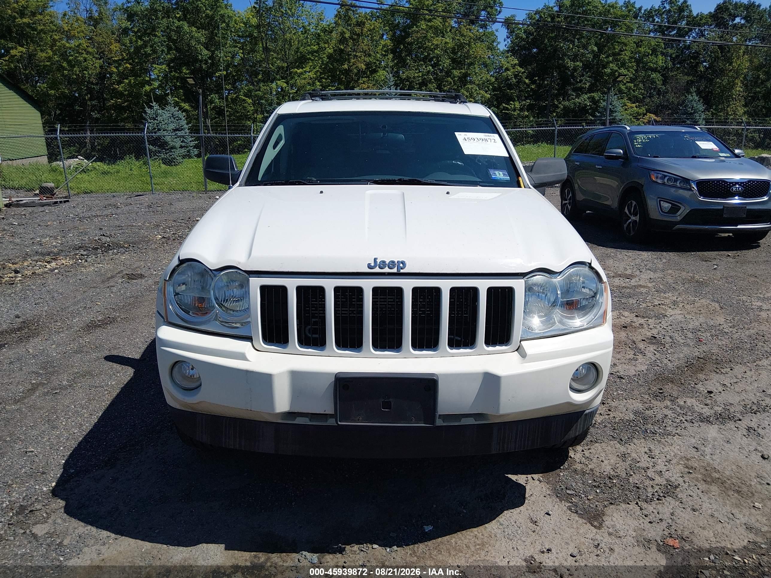2007 Jeep Grand Cherokee Laredo/columbia/freedom Белый vin: 1J8GR48K57C615498