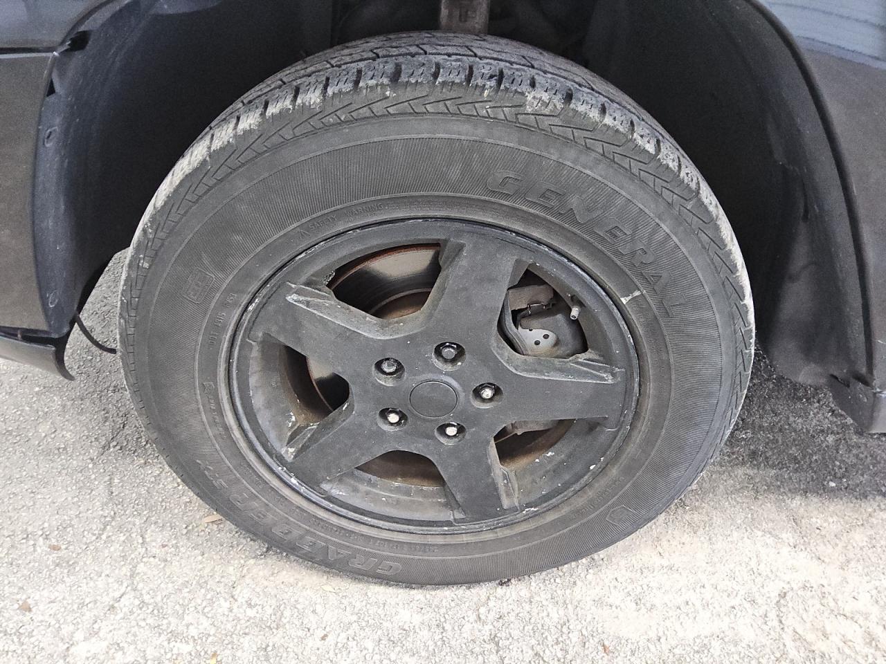 2007 Jeep Grand Cherokee Laredo Black vin: 1J8GR48K57C619616 Damage: Left Front Wheel, Curb Rash, 6 To 7 Inches