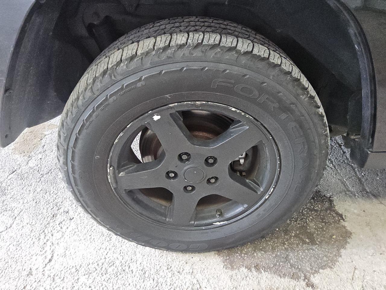 2007 Jeep Grand Cherokee Laredo Black vin: 1J8GR48K57C619616 Damage: Right Rear Wheel, Curb Rash, > 12 Inches