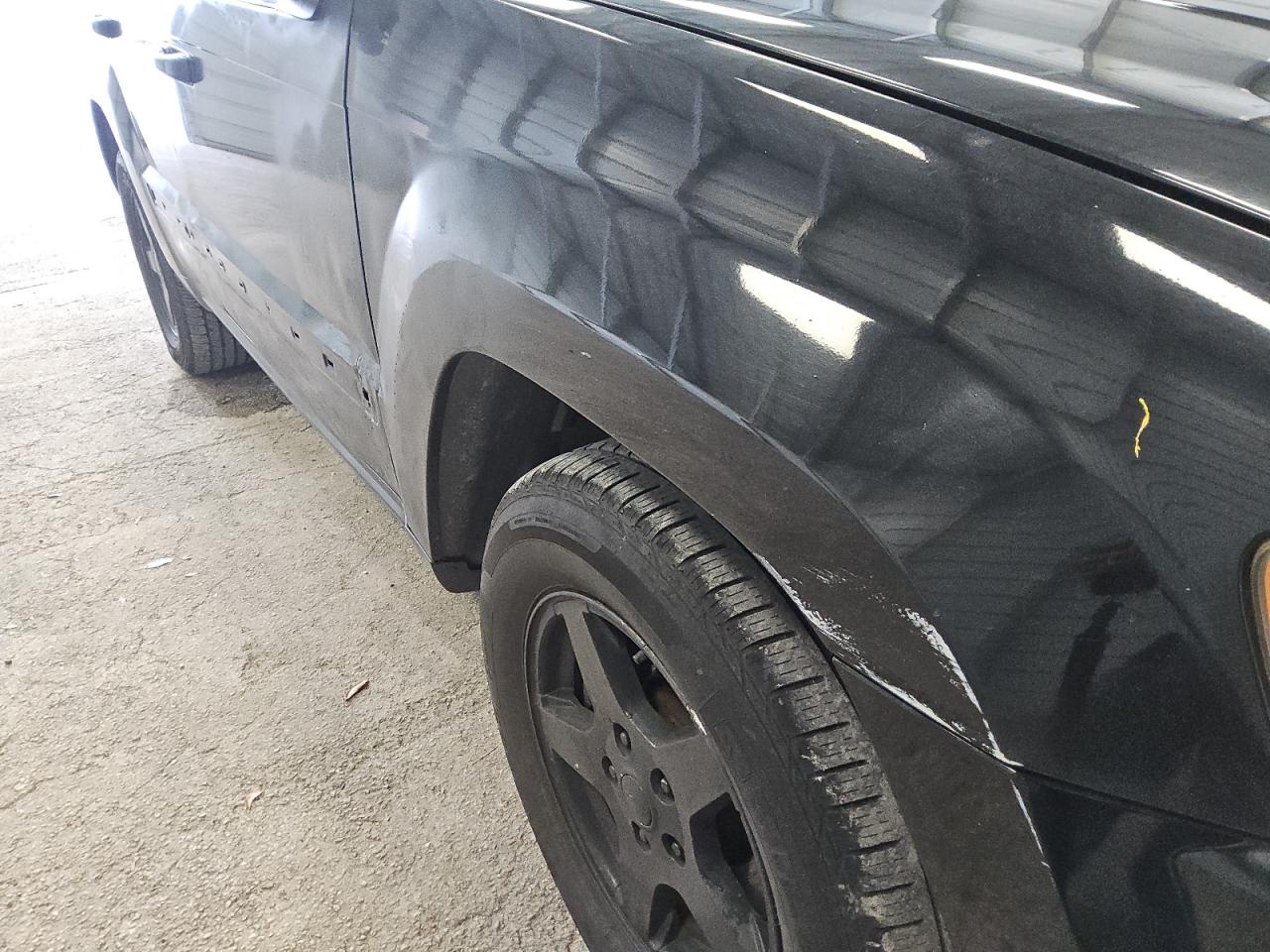2007 Jeep Grand Cherokee Laredo Black vin: 1J8GR48K57C619616 Damage: Right Front Fender, Multiple Scratches Heavy, 4