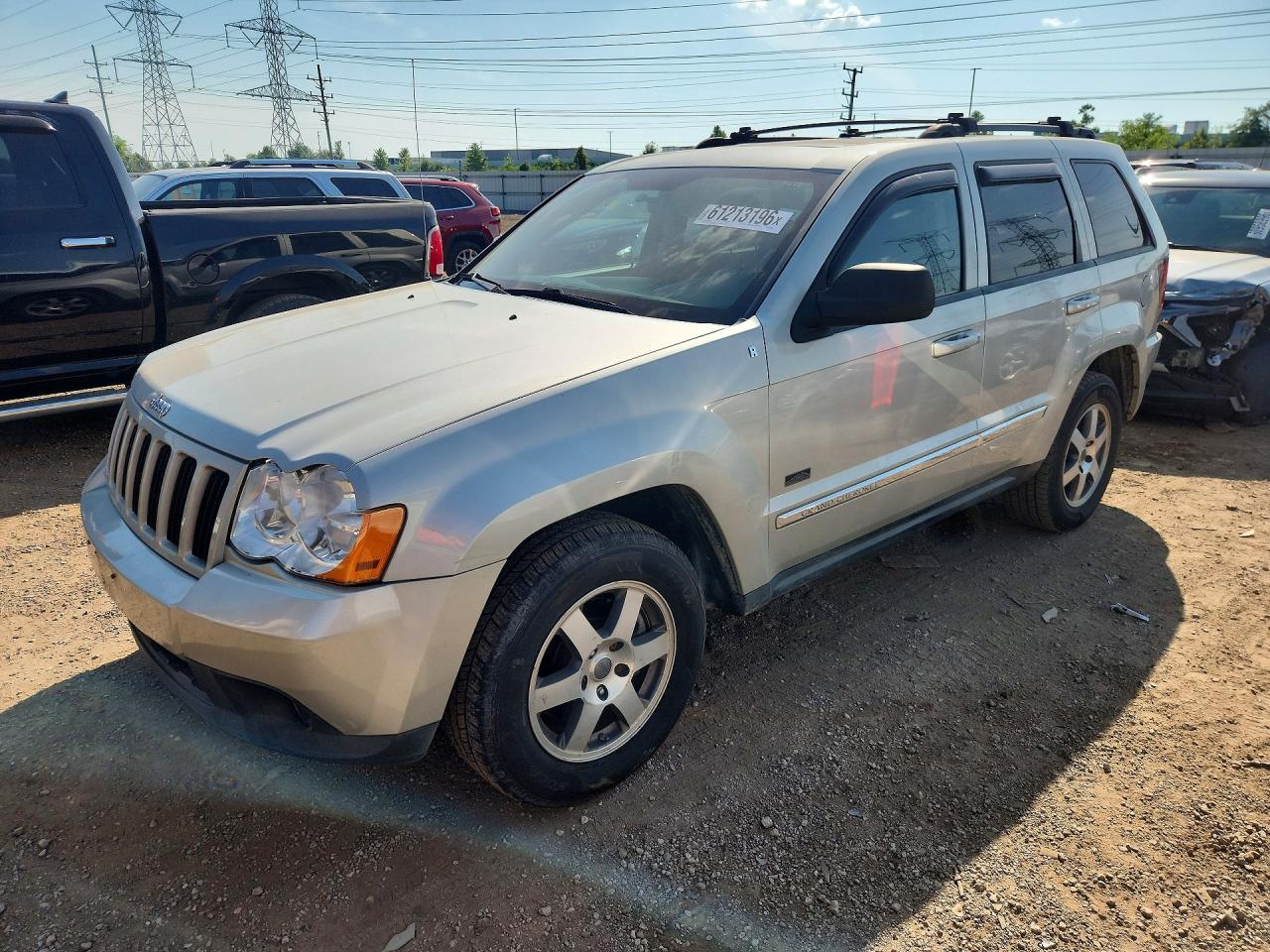 2009 Jeep Grand Cherokee Laredo Cream vin: 1J8GR48K69C555542