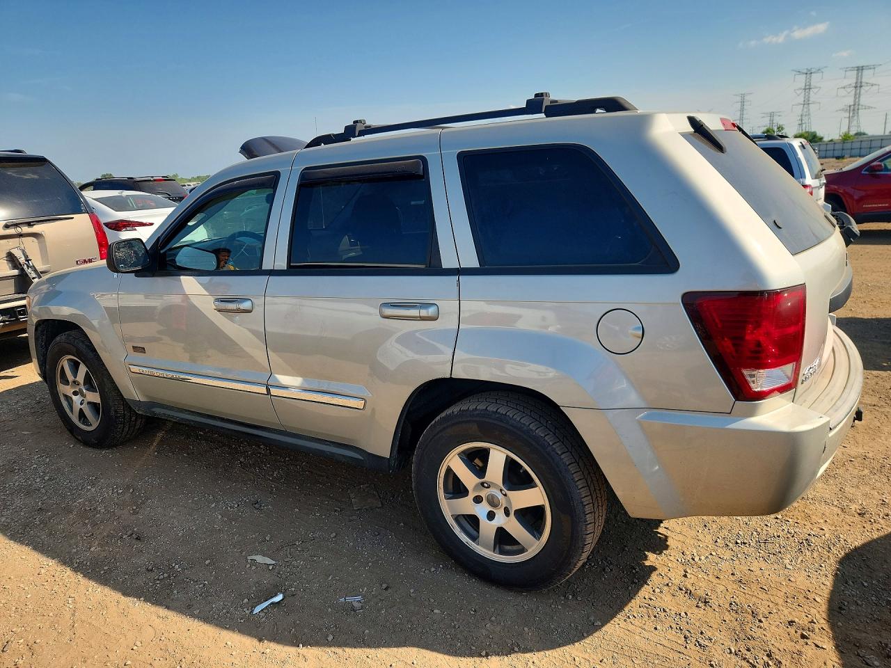 2009 Jeep Grand Cherokee Laredo Cream vin: 1J8GR48K69C555542