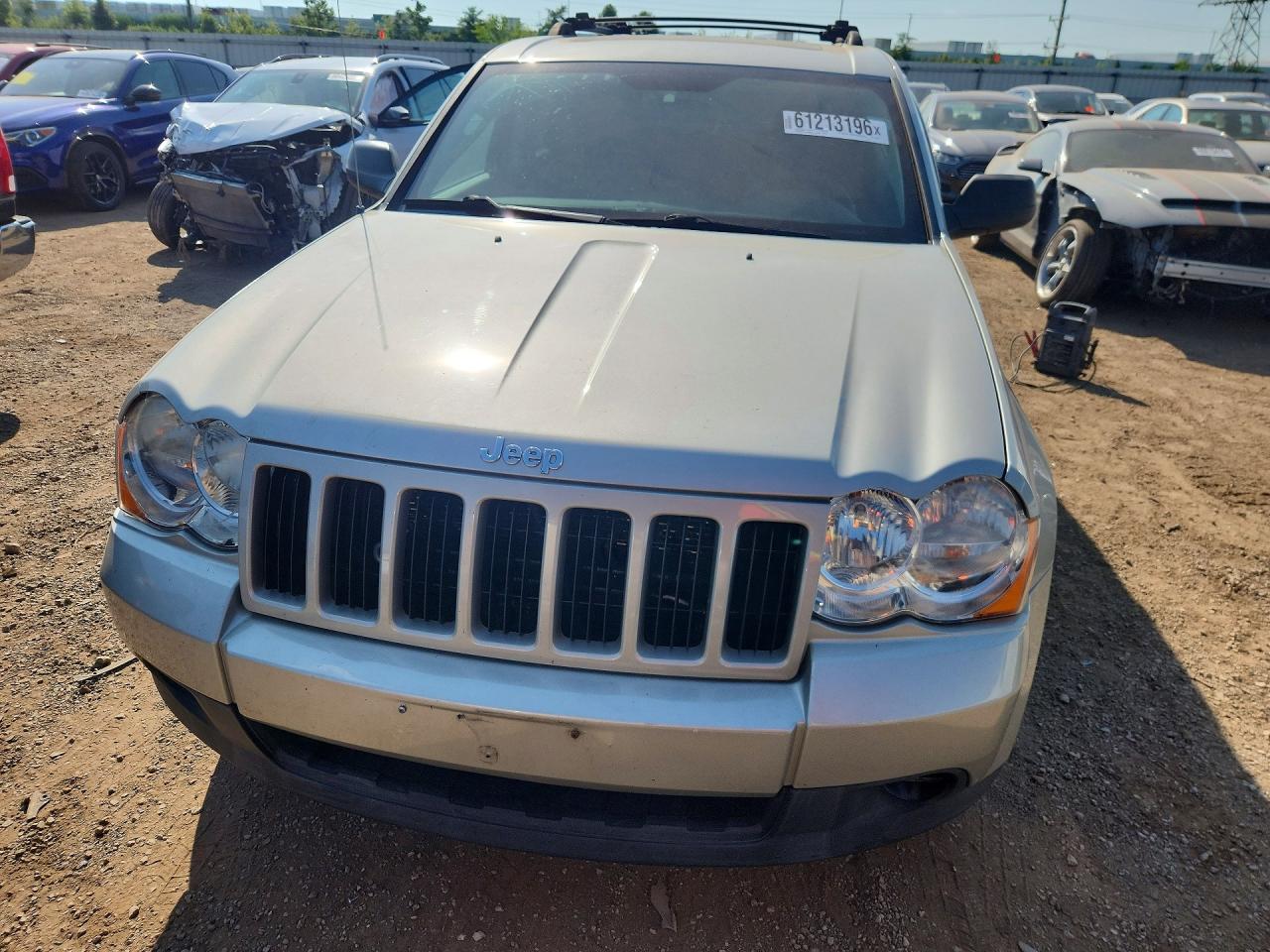 2009 Jeep Grand Cherokee Laredo Cream vin: 1J8GR48K69C555542
