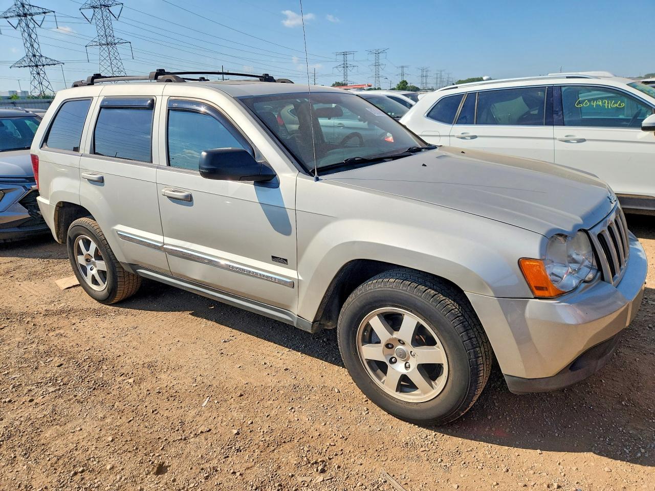 2009 Jeep Grand Cherokee Laredo Cream vin: 1J8GR48K69C555542