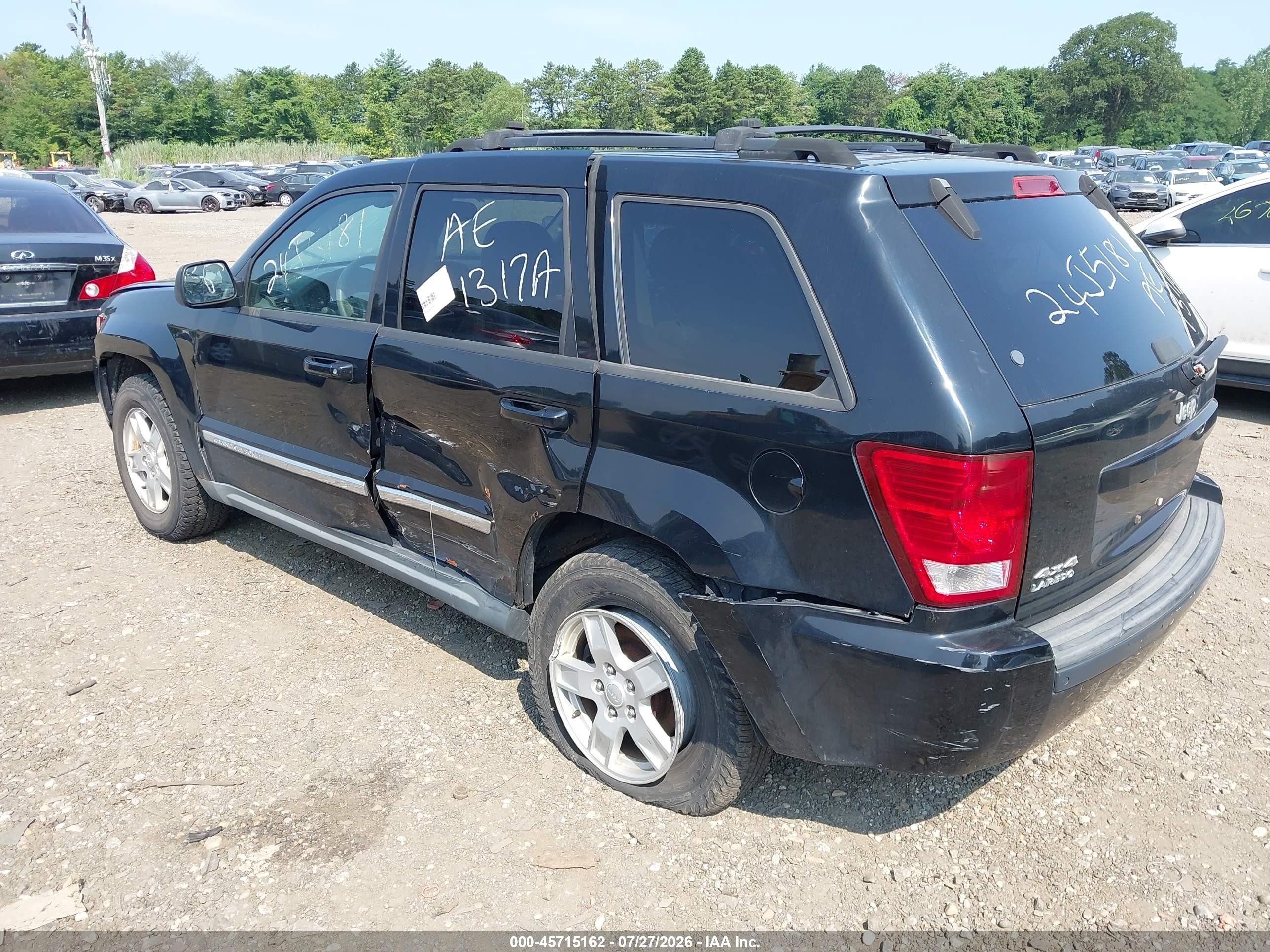 2007 Jeep Grand Cherokee Laredo Черный vin: 1J8GR48K77C517976