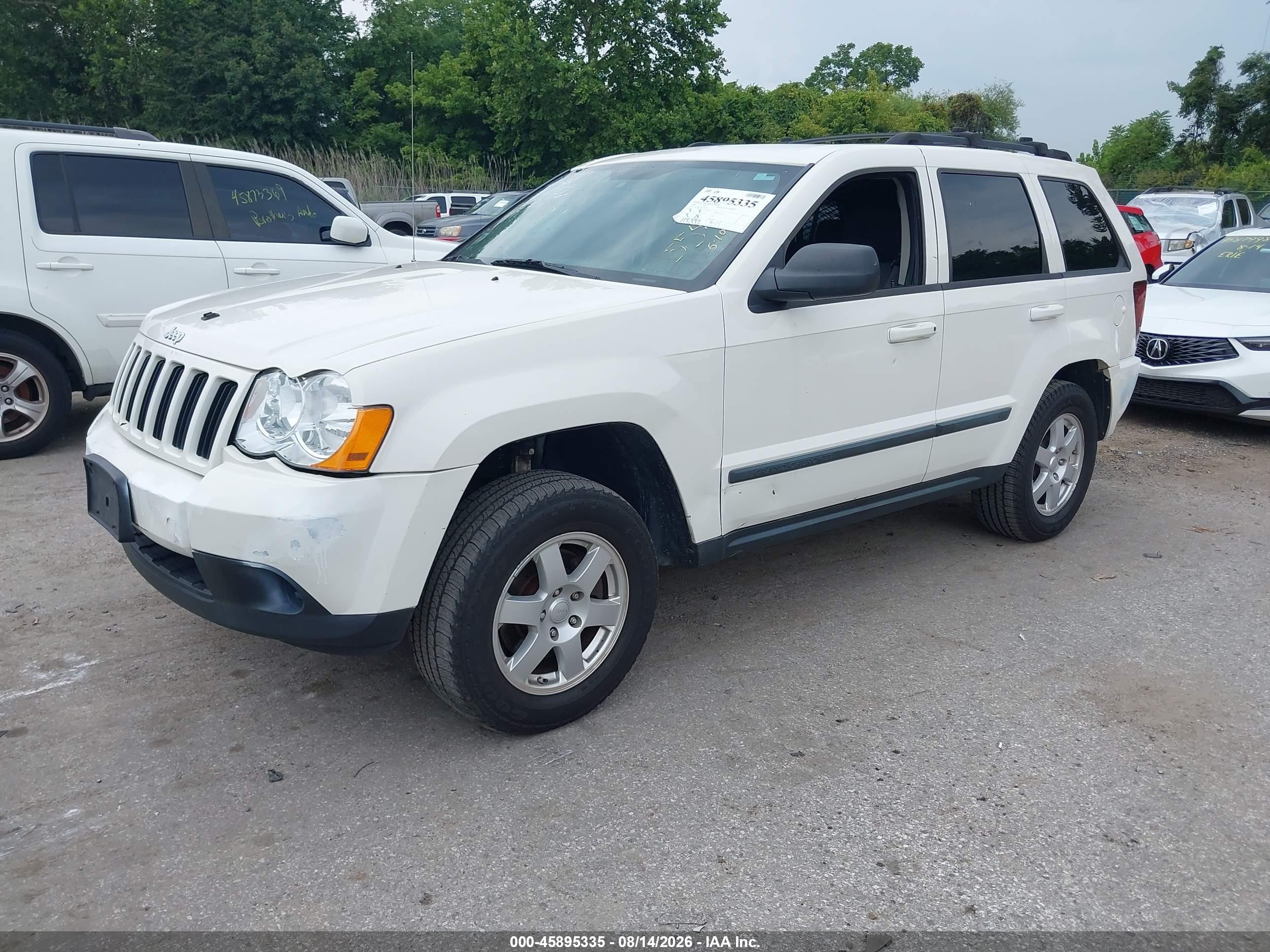 2009 Jeep Grand Cherokee Laredo Белый vin: 1J8GR48K79C526700