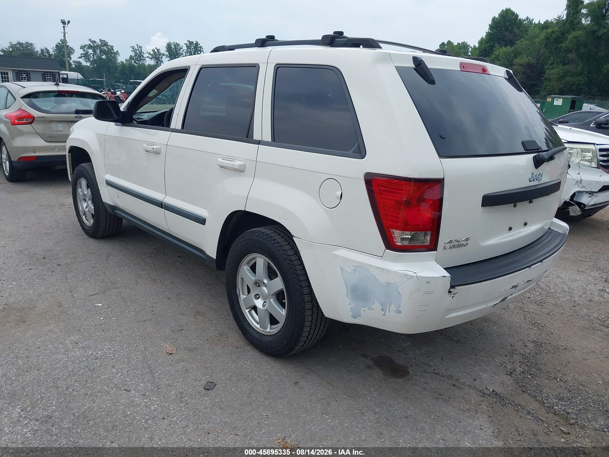2009 Jeep Grand Cherokee Laredo Белый vin: 1J8GR48K79C526700