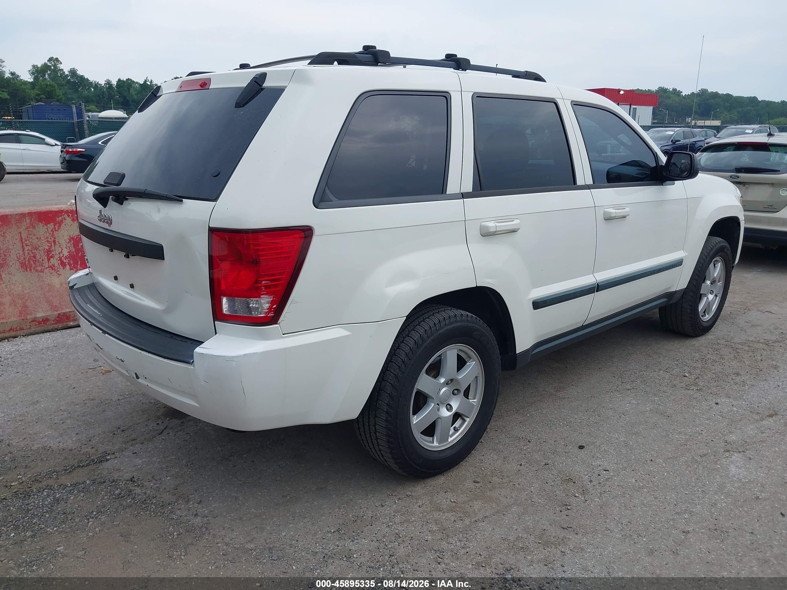 2009 Jeep Grand Cherokee Laredo Белый vin: 1J8GR48K79C526700