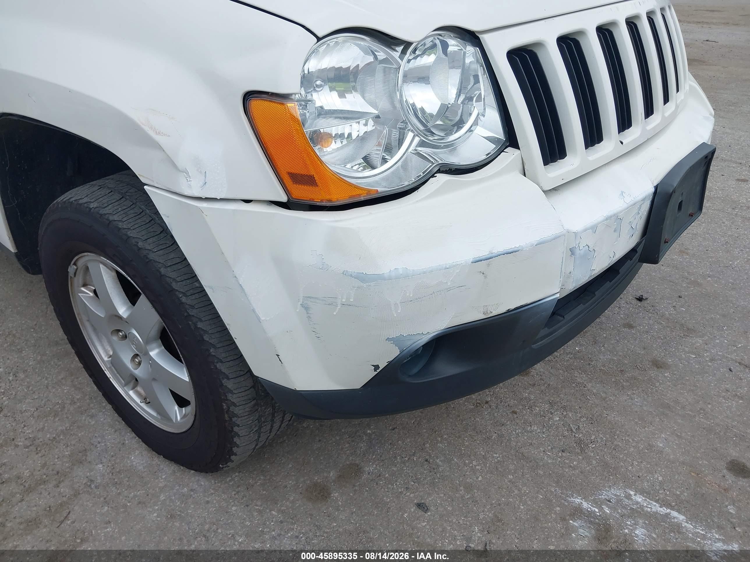 2009 Jeep Grand Cherokee Laredo Белый vin: 1J8GR48K79C526700