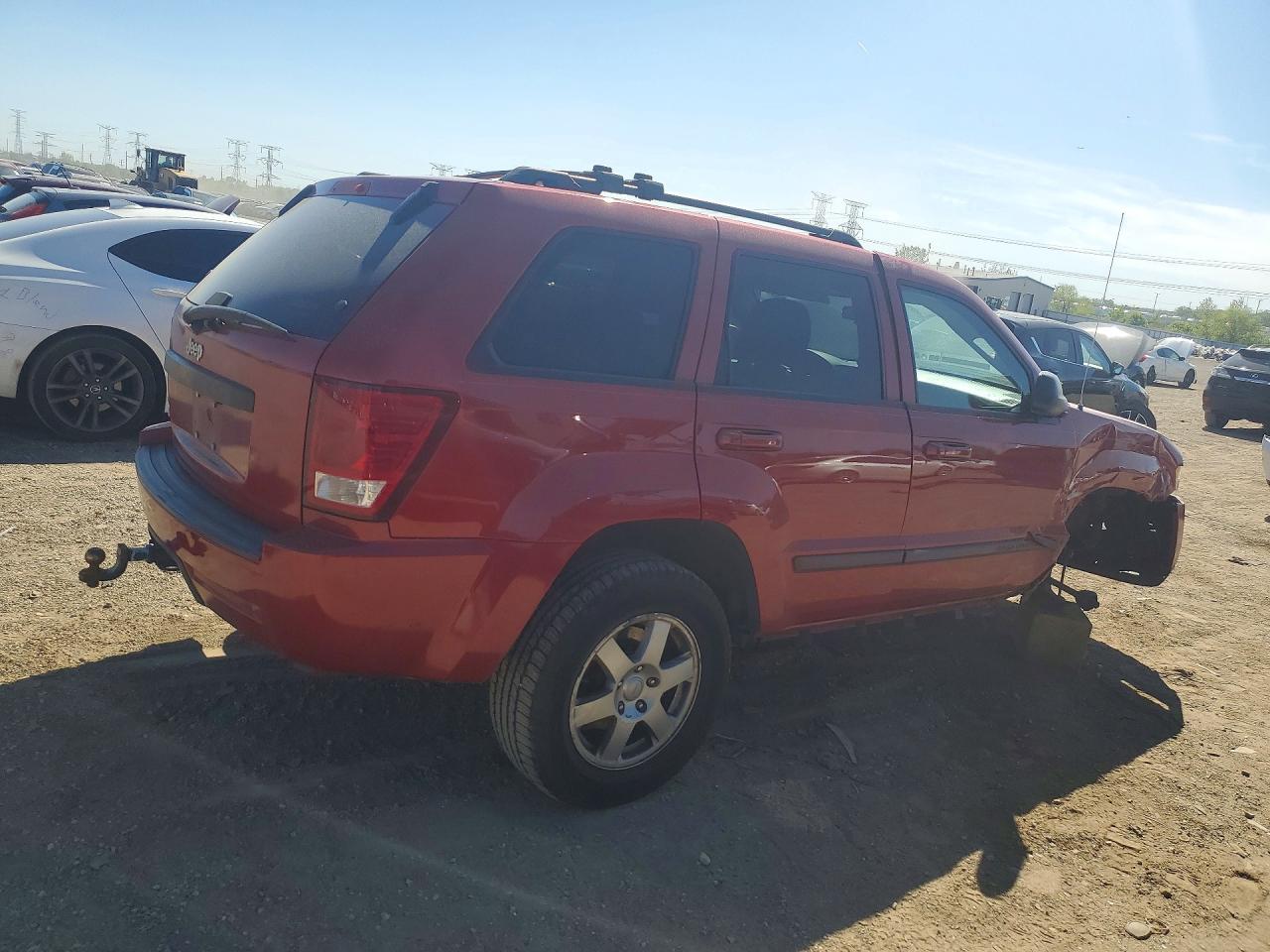 2009 Jeep Grand Cherokee Laredo Red vin: 1J8GR48K89C546342