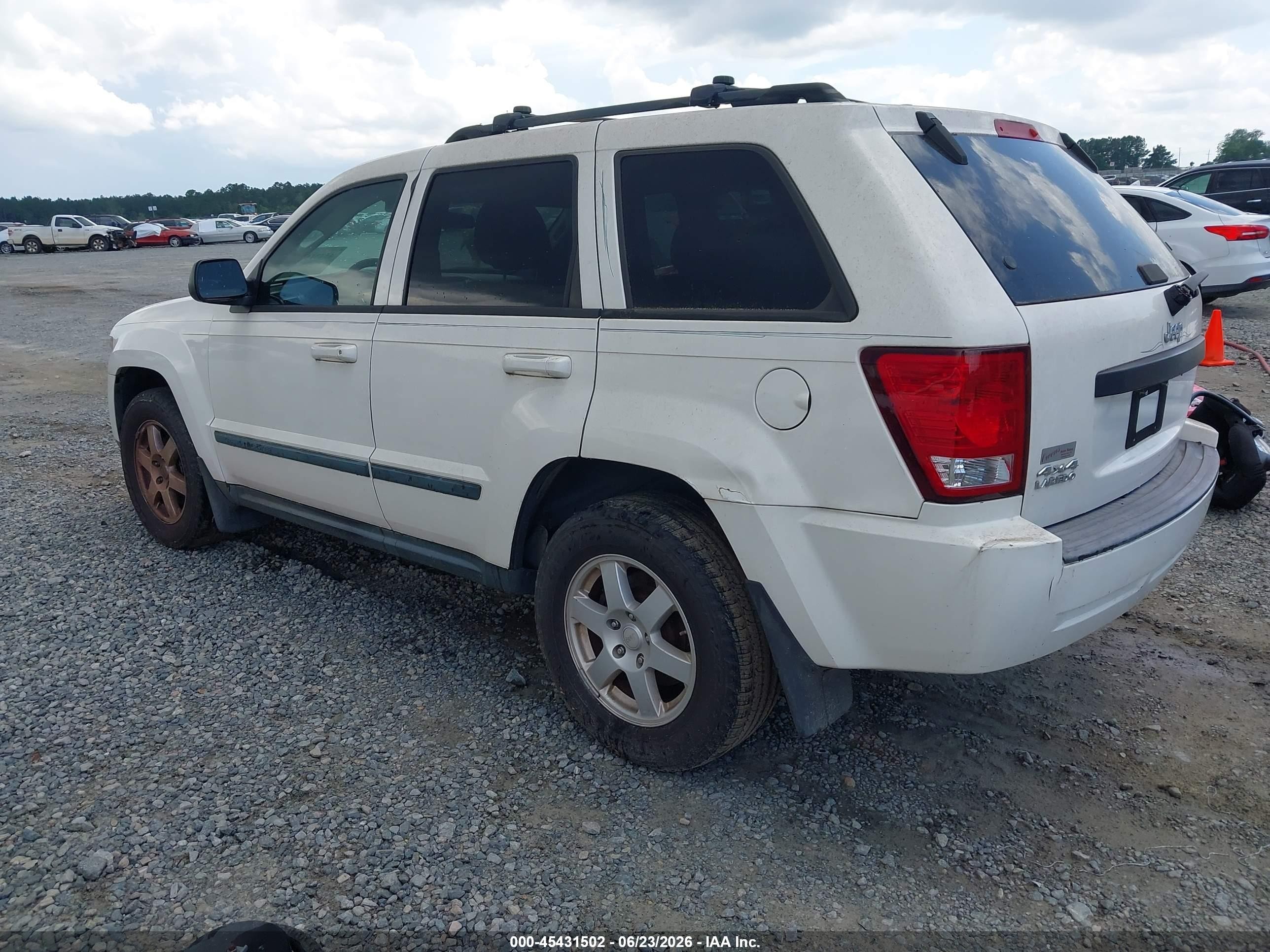 2008 Jeep Grand Cherokee Laredo Белый vin: 1J8GR48K98C103776