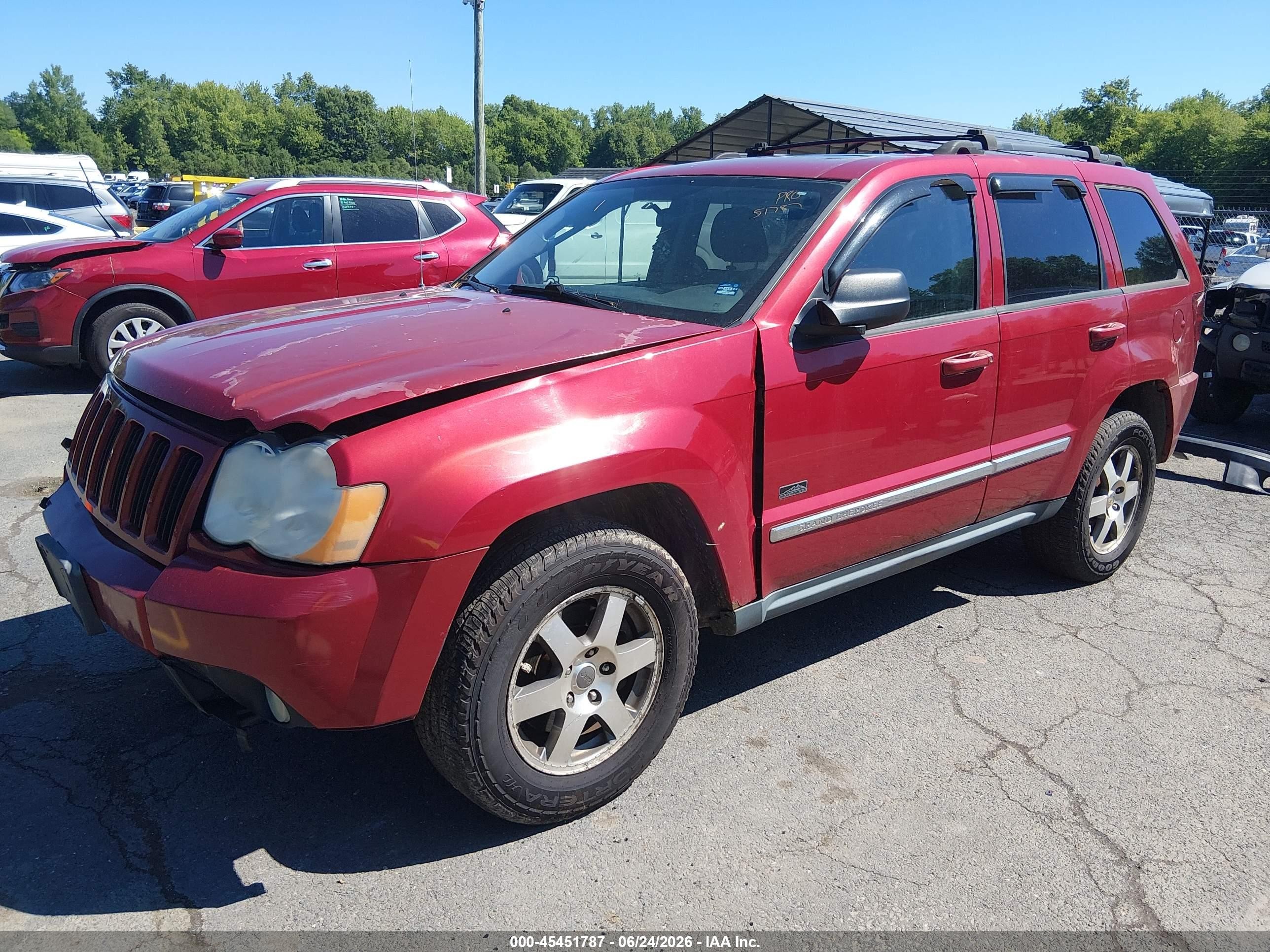 2009 Jeep Grand Cherokee Laredo Red vin: 1J8GR48KX9C543331