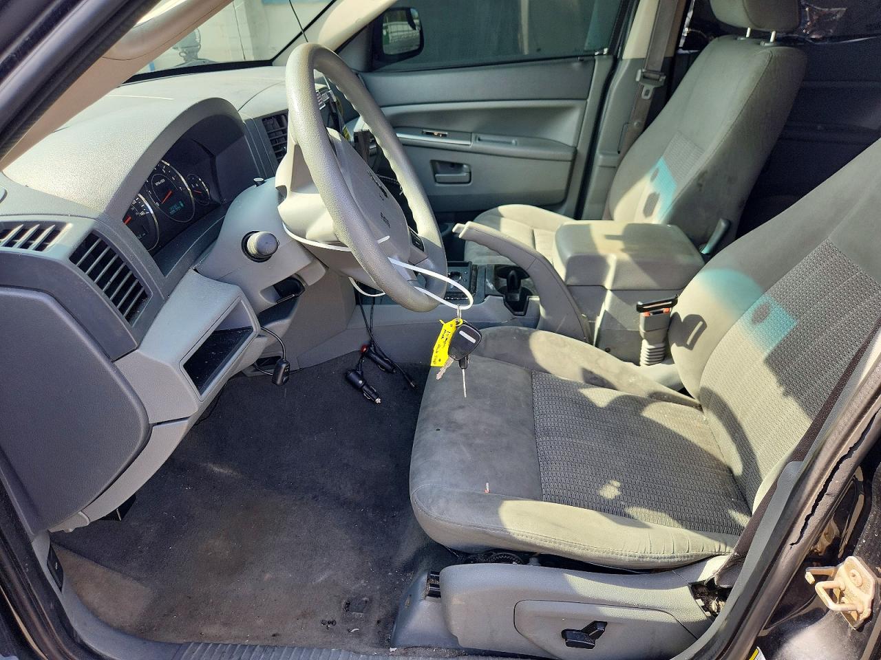 2007 Jeep Grand Cherokee Laredo Черный vin: 1J8GS48K27C516769