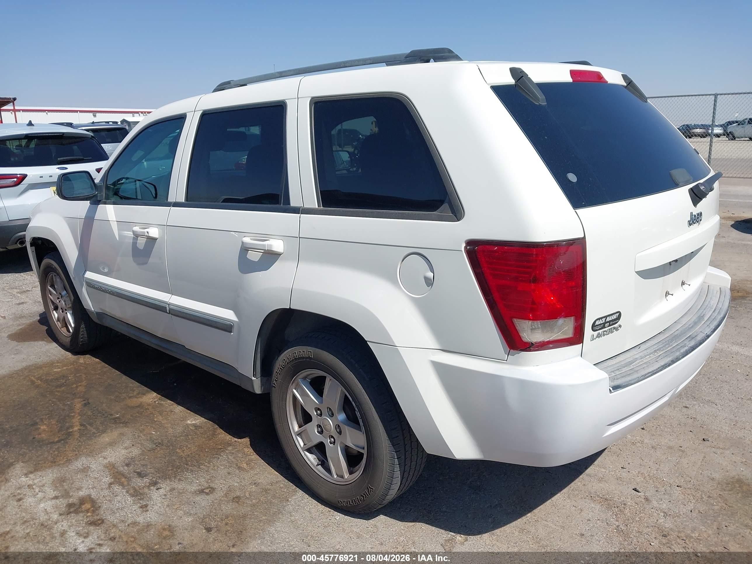 2007 Jeep Grand Cherokee Laredo Белый vin: 1J8GS48K47C516031