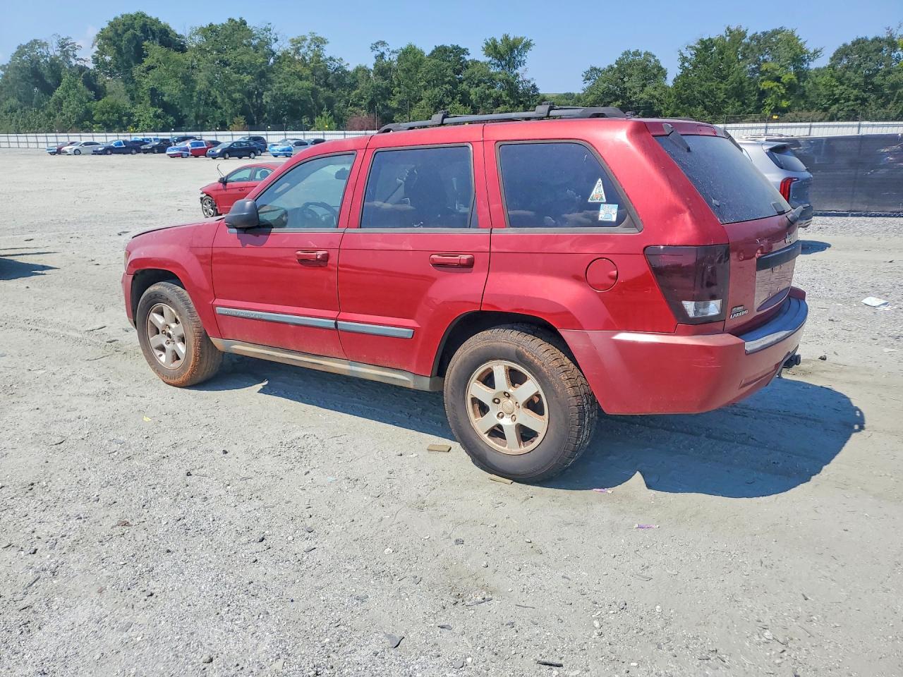 2009 Jeep Grand Cherokee Laredo Red vin: 1J8GS48K49C549940