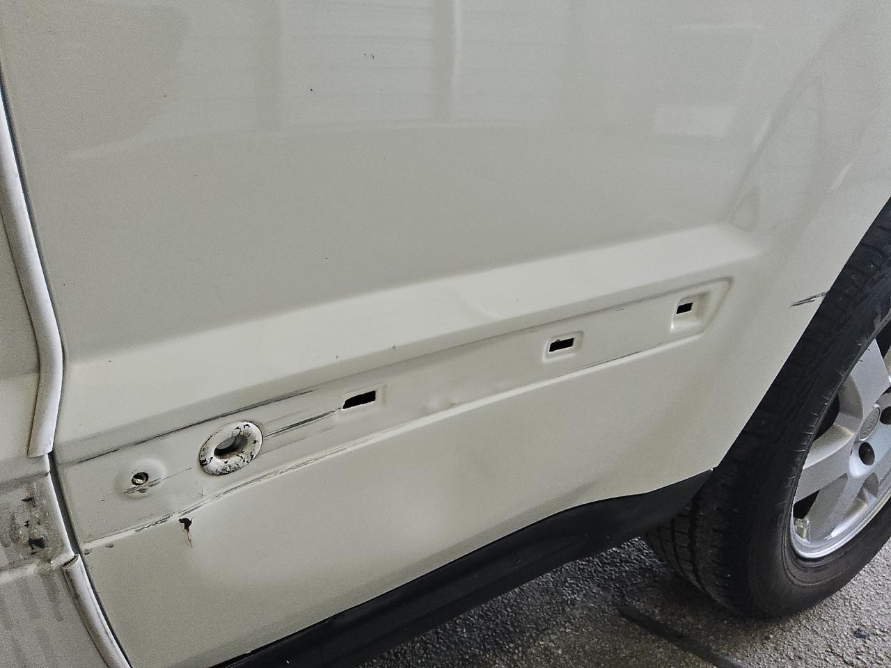 2009 Jeep Grand Cherokee Laredo White vin: 1J8GS48K59C538302 Damage: Left Rear Door, Dent(S) W/ Paint Dmg, 8 To 9 Inches