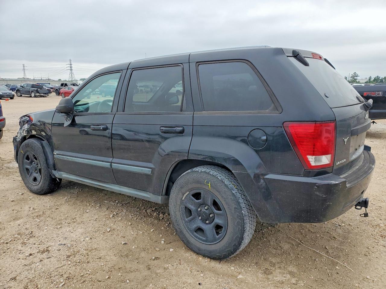 2008 Jeep Grand Cherokee Laredo Черный vin: 1J8GS48K68C121852