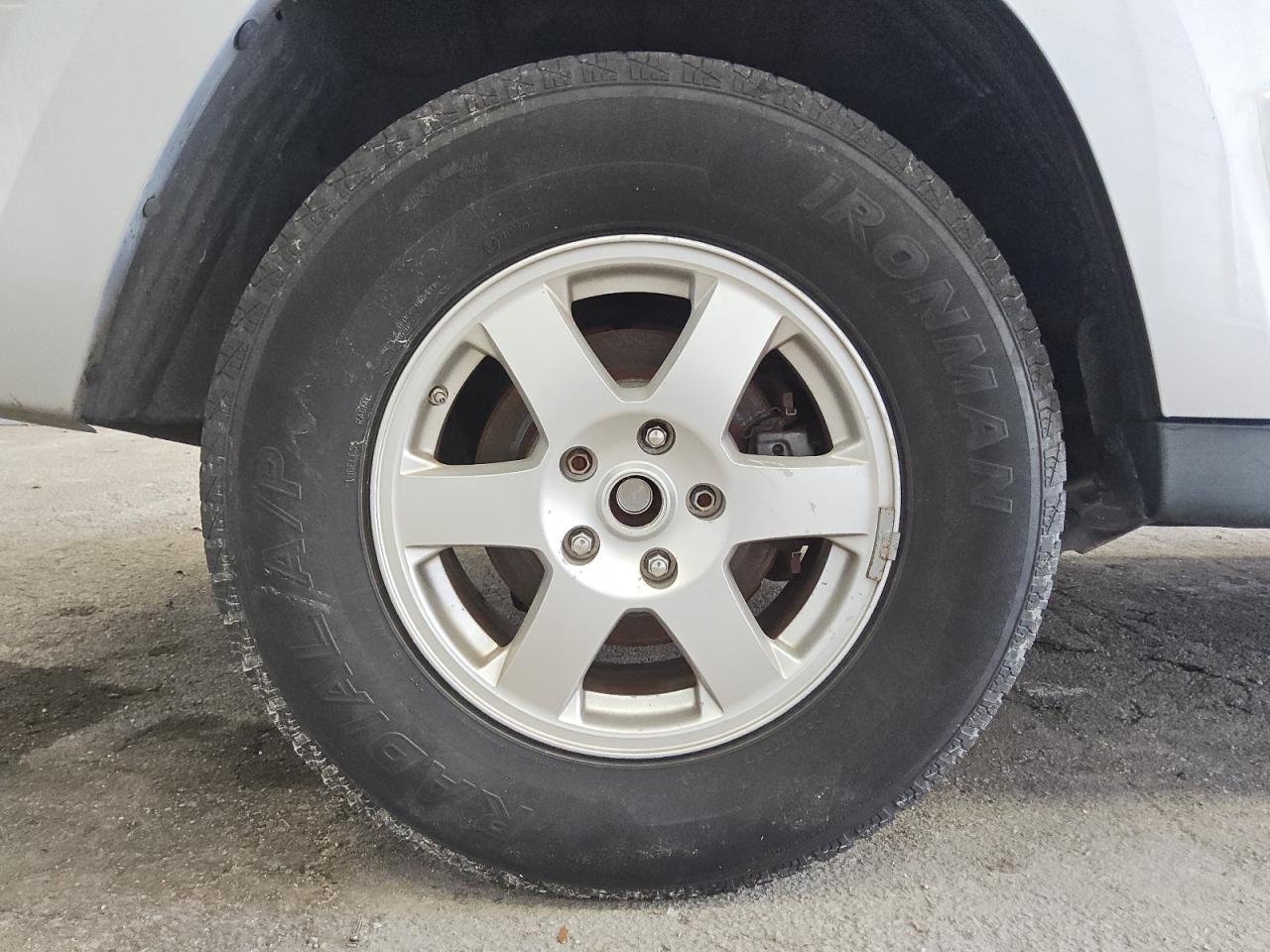 2009 Jeep Grand Cherokee Laredo Silver vin: 1J8GS48KX9C521110 Damage: Right Rear Center Cap, Missing, Replacement Required