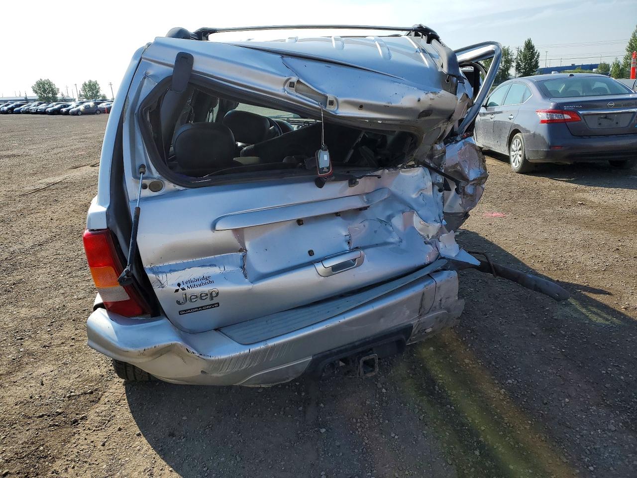 2004 Jeep Grand Cherokee Overland Silver vin: 1J8GW68J54C264342