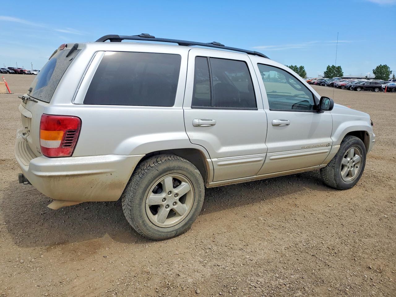 2004 Jeep Grand Cherokee Overland Silver vin: 1J8GW68JX4C348091