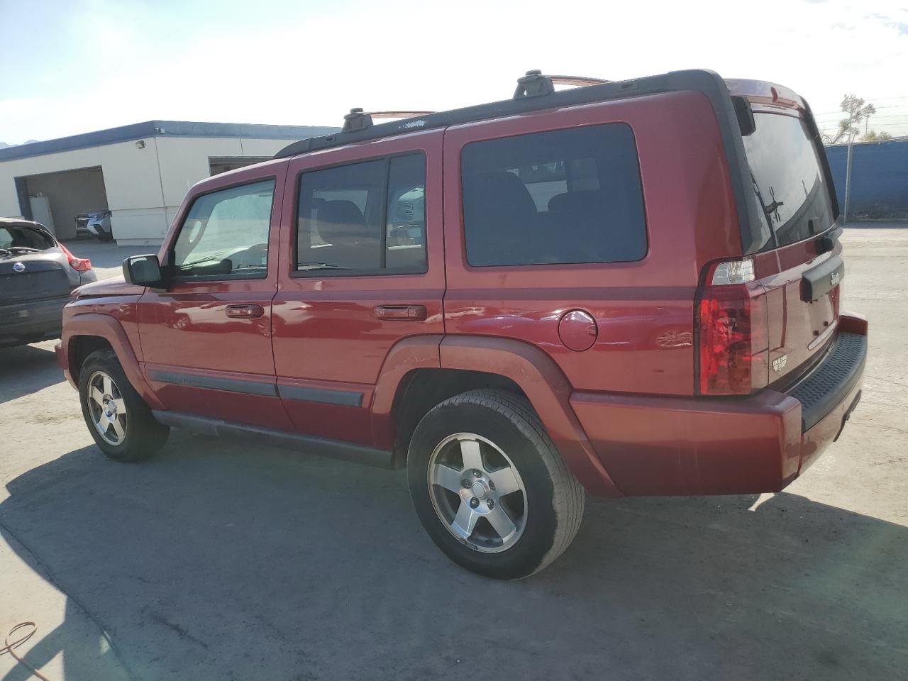 2009 Jeep Commander Red vin: 1J8HH48K99C555350