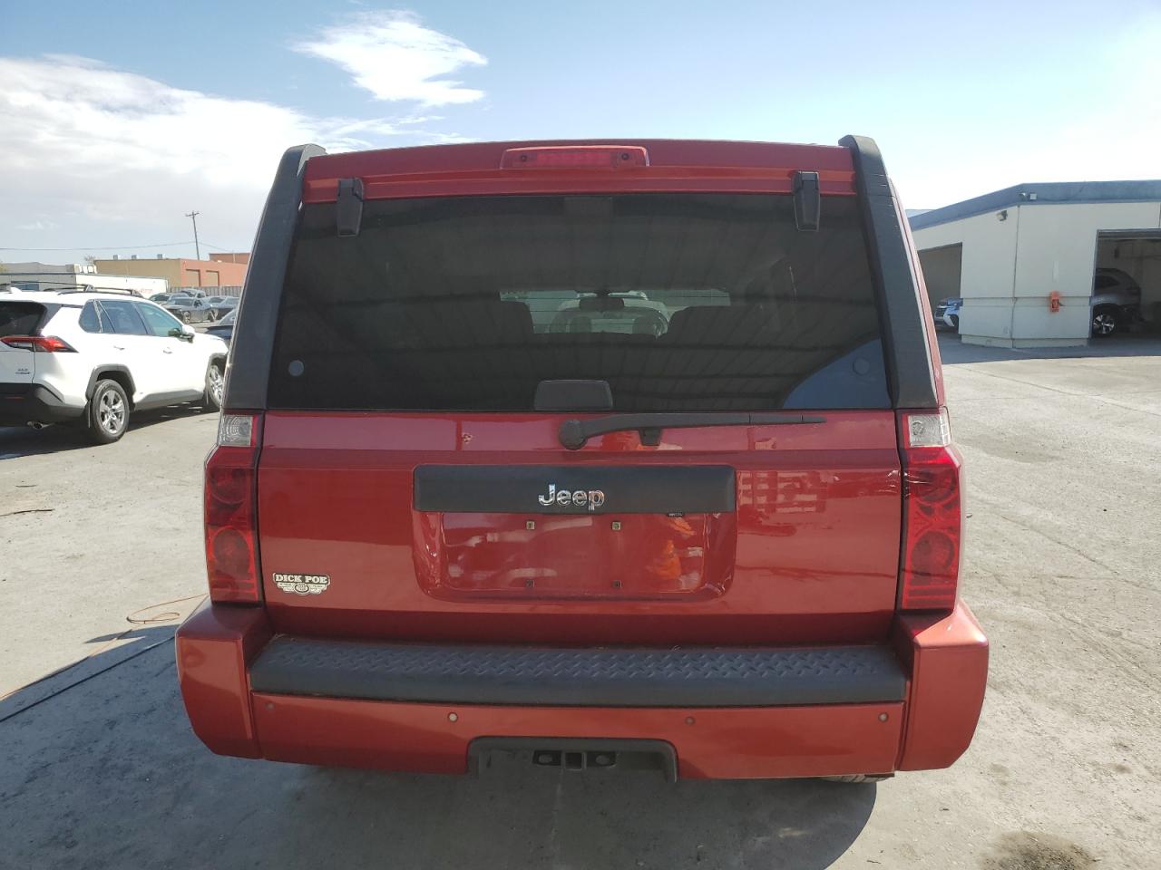 2009 Jeep Commander Red vin: 1J8HH48K99C555350