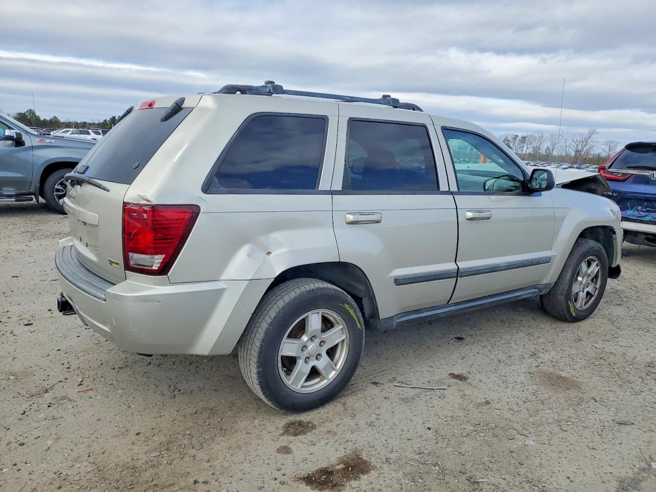 2007 Jeep Grand Cherokee Laredo Серебряный vin: 1J8HR48P77C555336