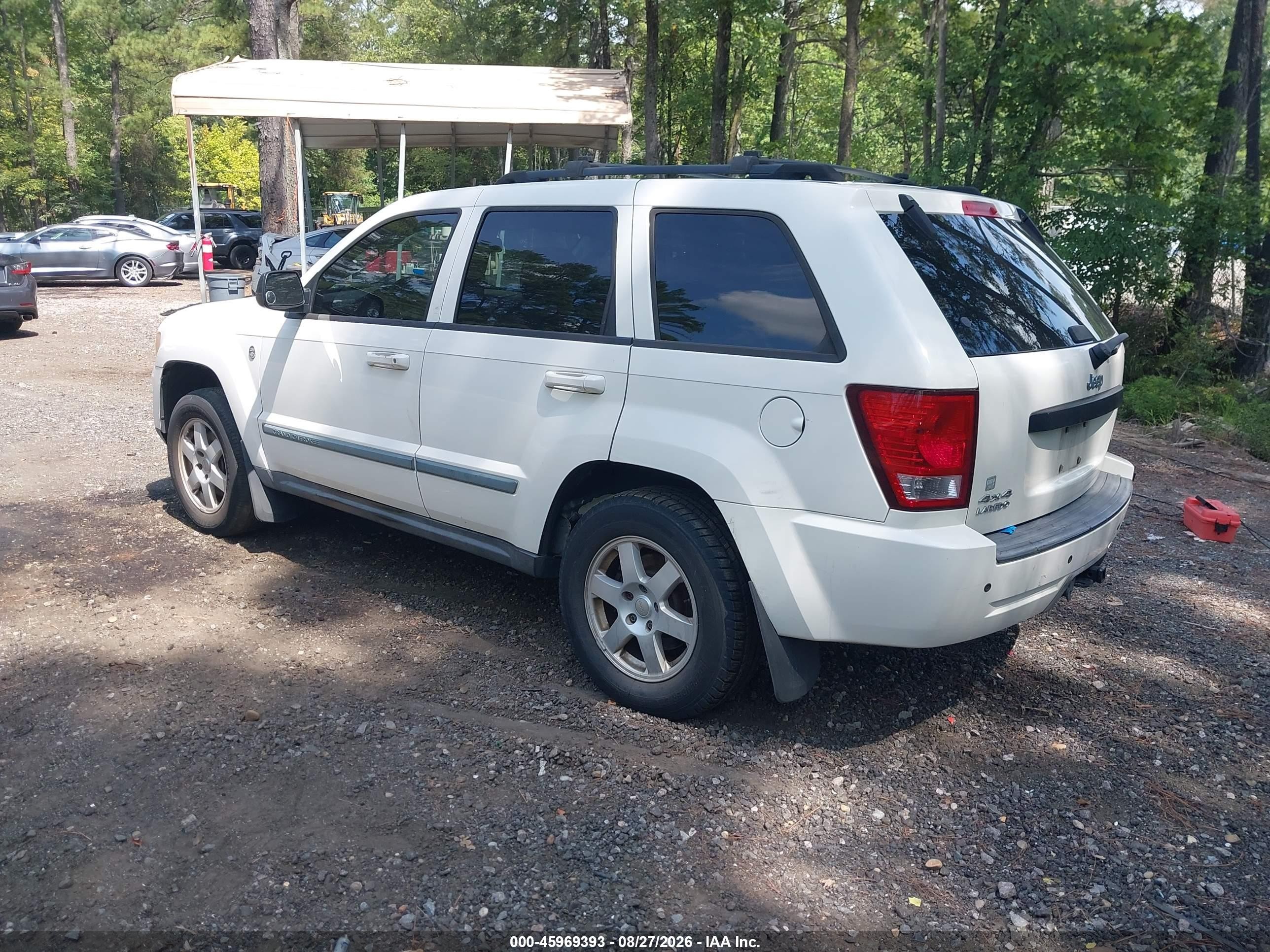2009 Jeep Grand Cherokee Laredo Белый vin: 1J8HR48P89C545675