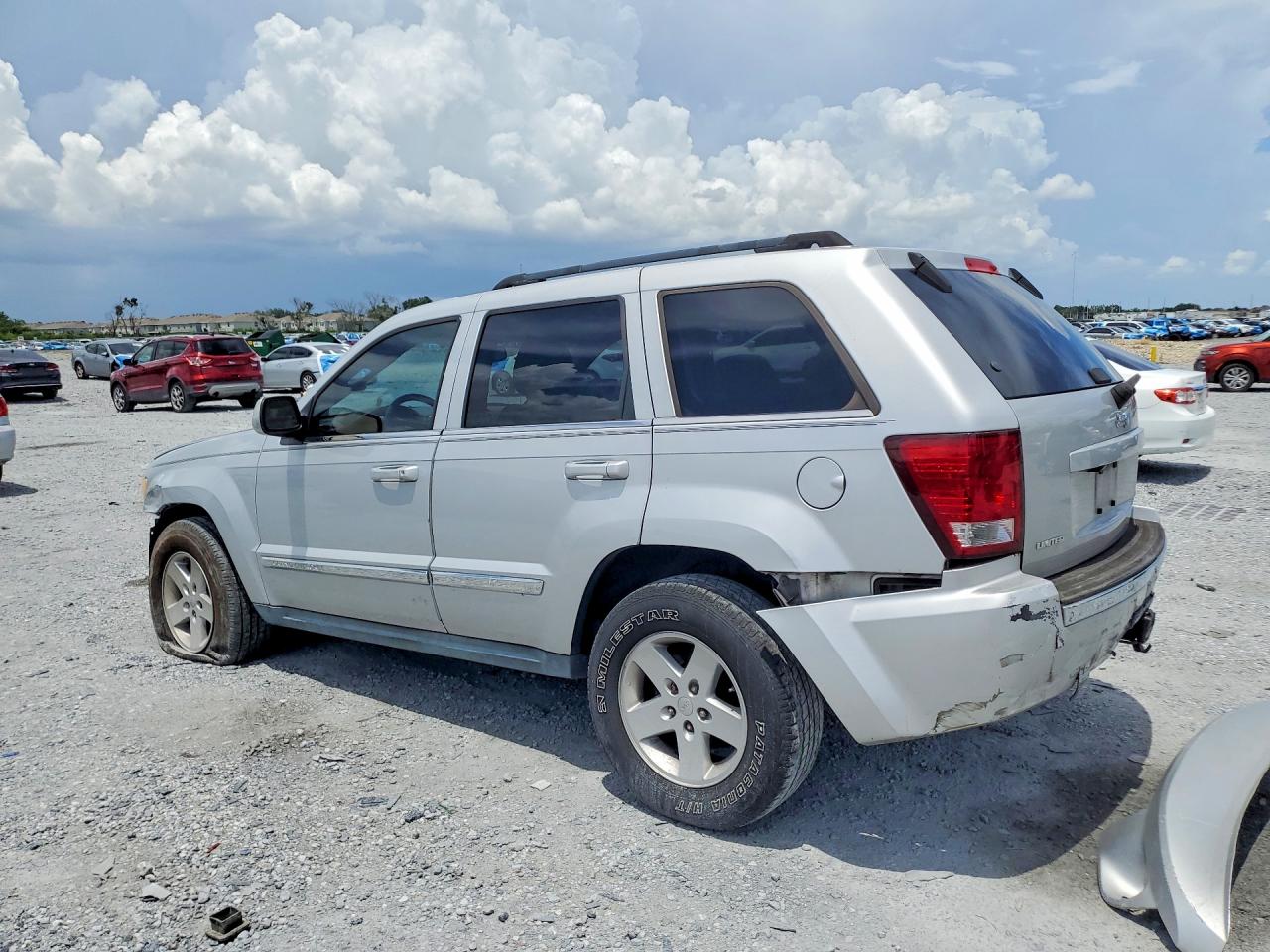 2009 Jeep Grand Cherokee Limited Silver vin: 1J8HS58T99C528195
