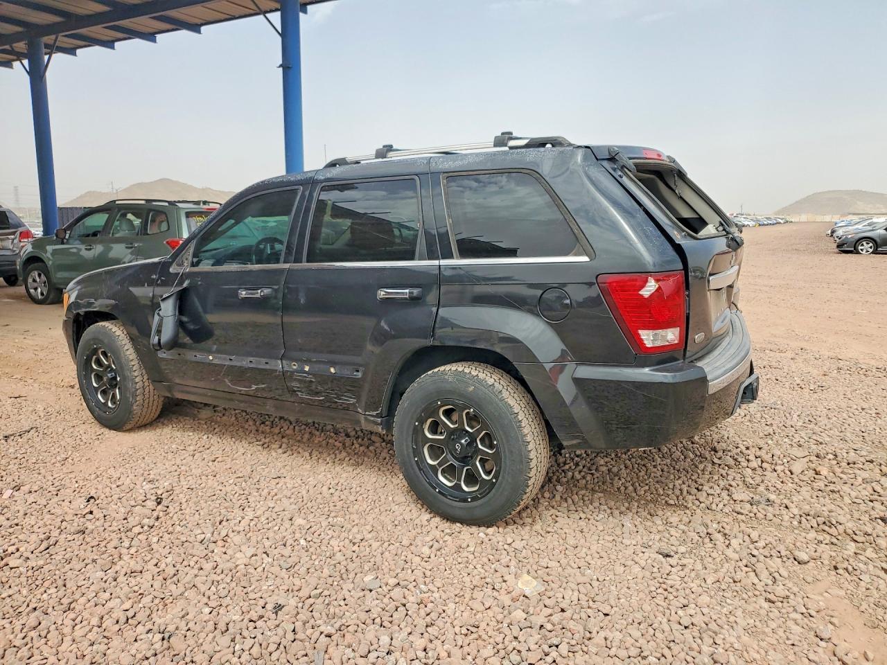 2009 Jeep Grand Cherokee Overland Black vin: 1J8HS68T99C554494