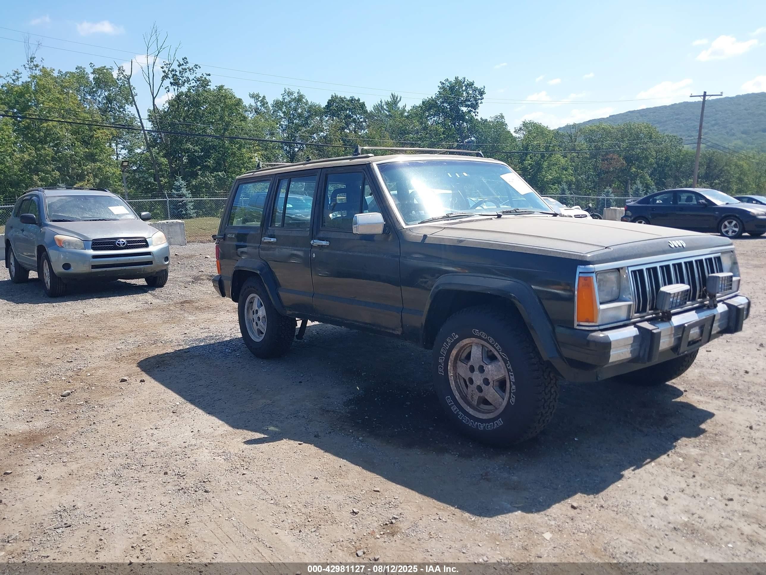 1988 Jeep Cherokee Laredo Черный vin: 1JCML784XJT022174