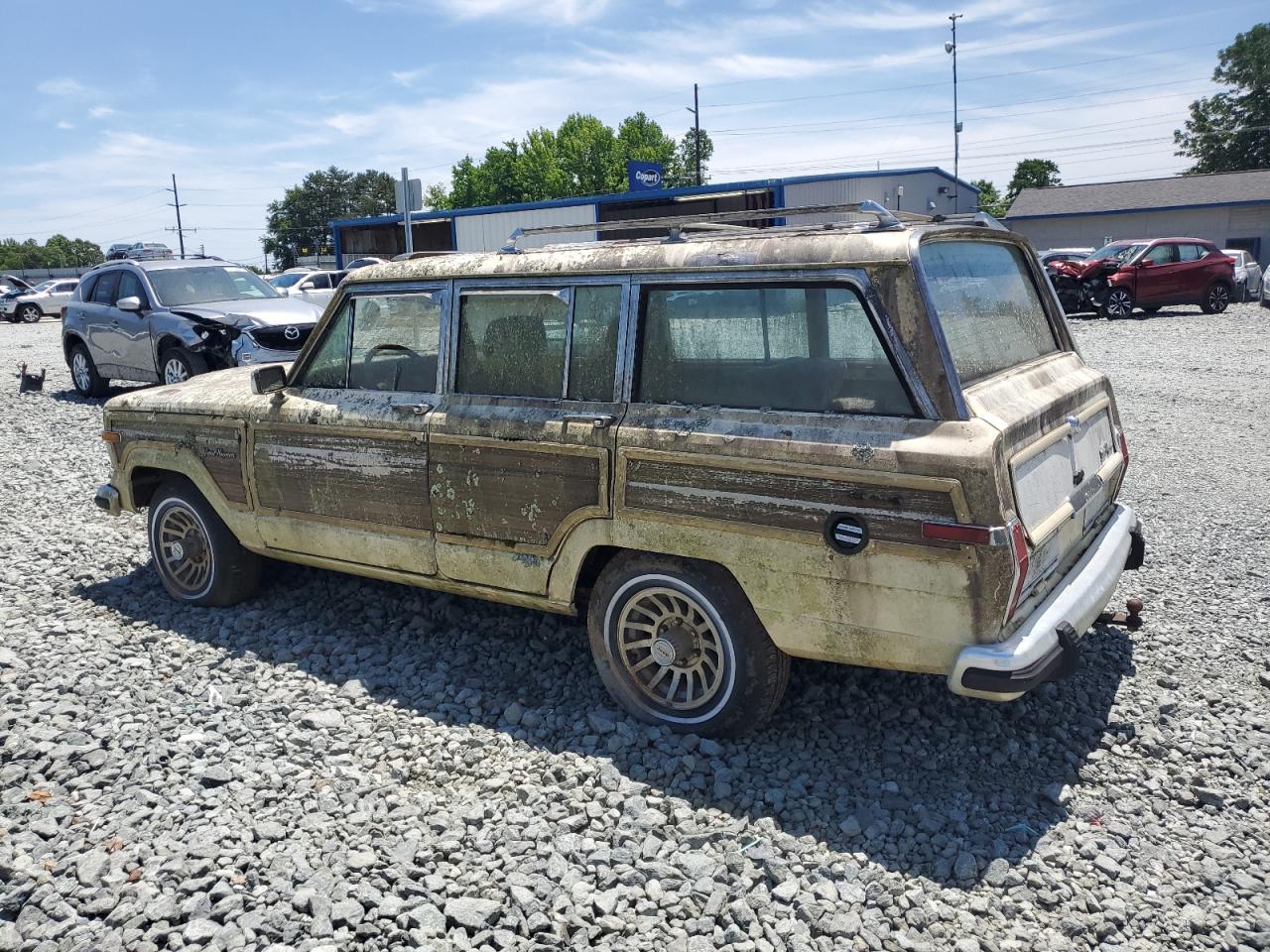 1988 Jeep Grand Wagoneer    Cream vin: 1JCNJ15U3JT159548