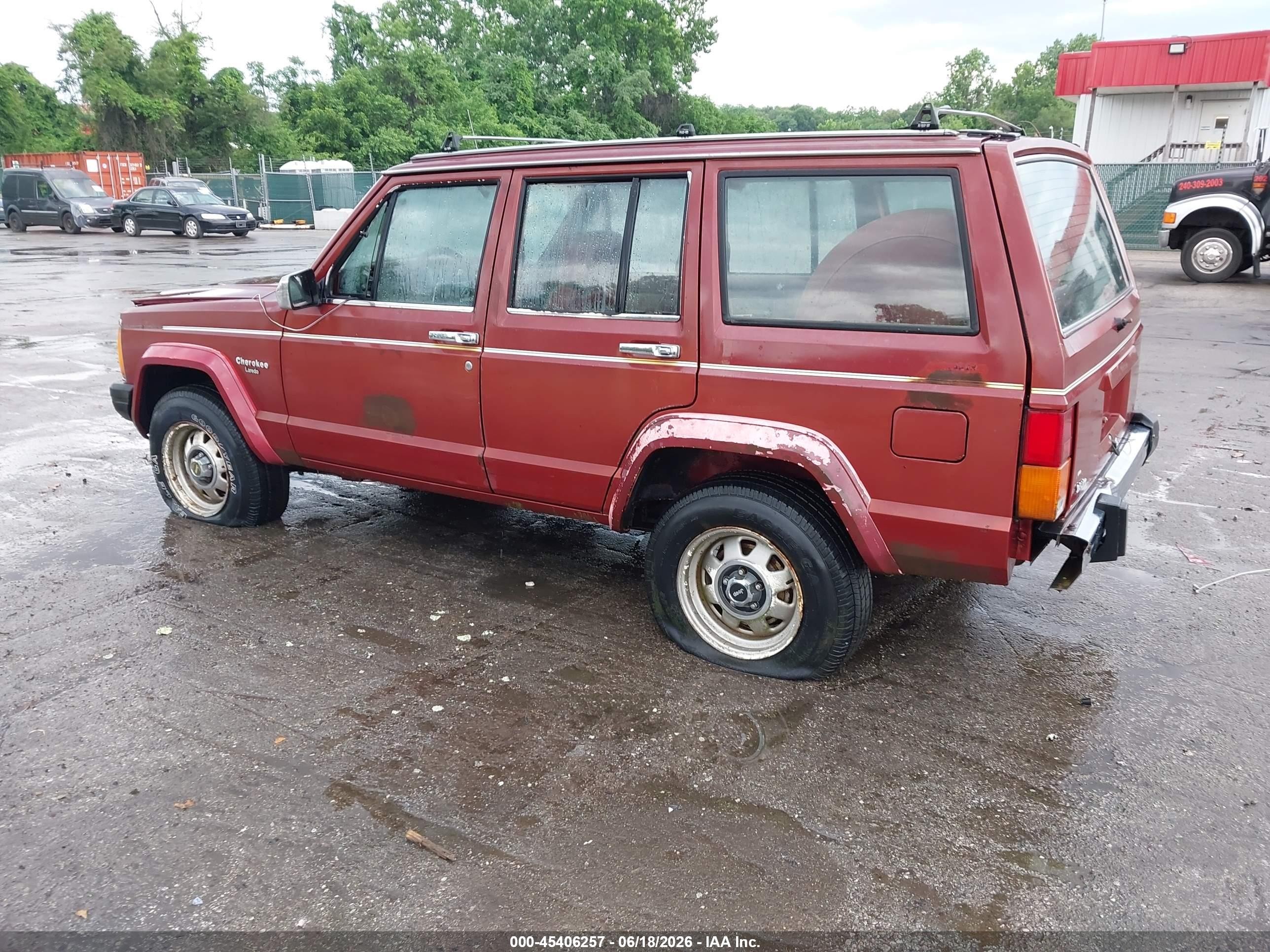 1985 Jeep Cherokee Laredo Burgundy vin: 1JCUL7844FT101878