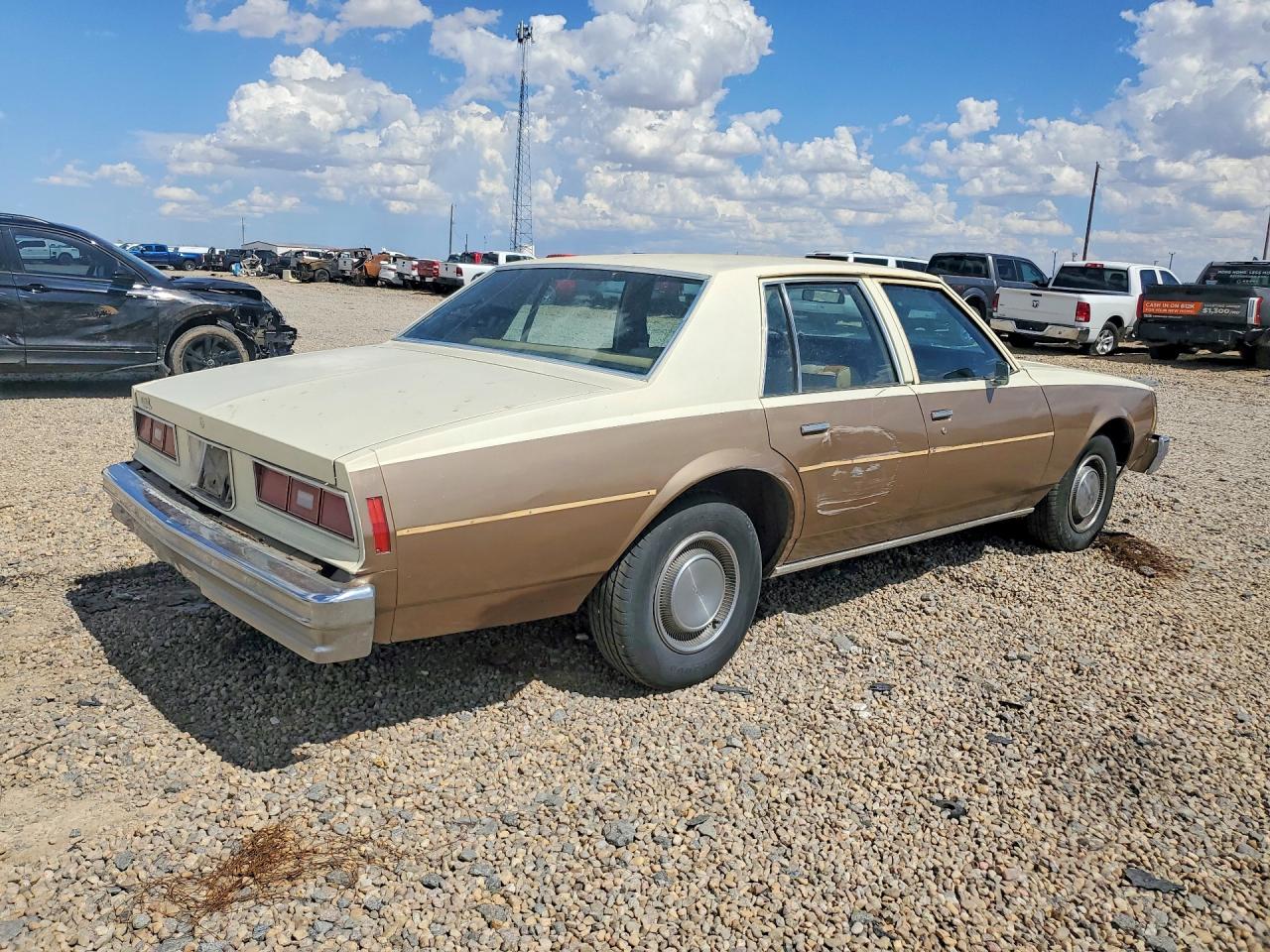 1977 Chevrolet Impala 4d Tan vin: 1L69U7S269079